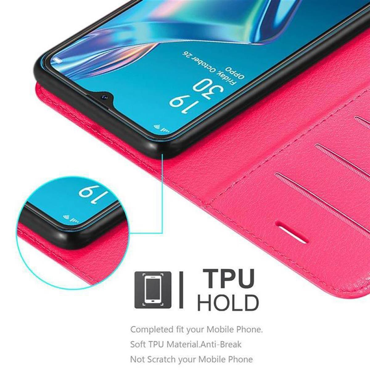 Custodia rosa per telefono con telefono. Il testo recita 'TPU HOLD'.