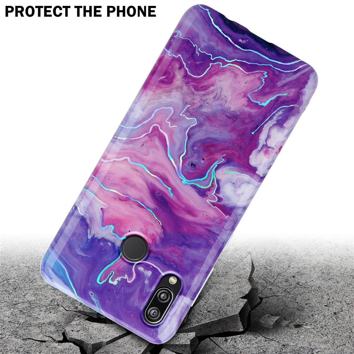 Una custodia per telefono con un design marmorizzato colorato. Il telefono è su una superficie di cemento, con crepe intorno.