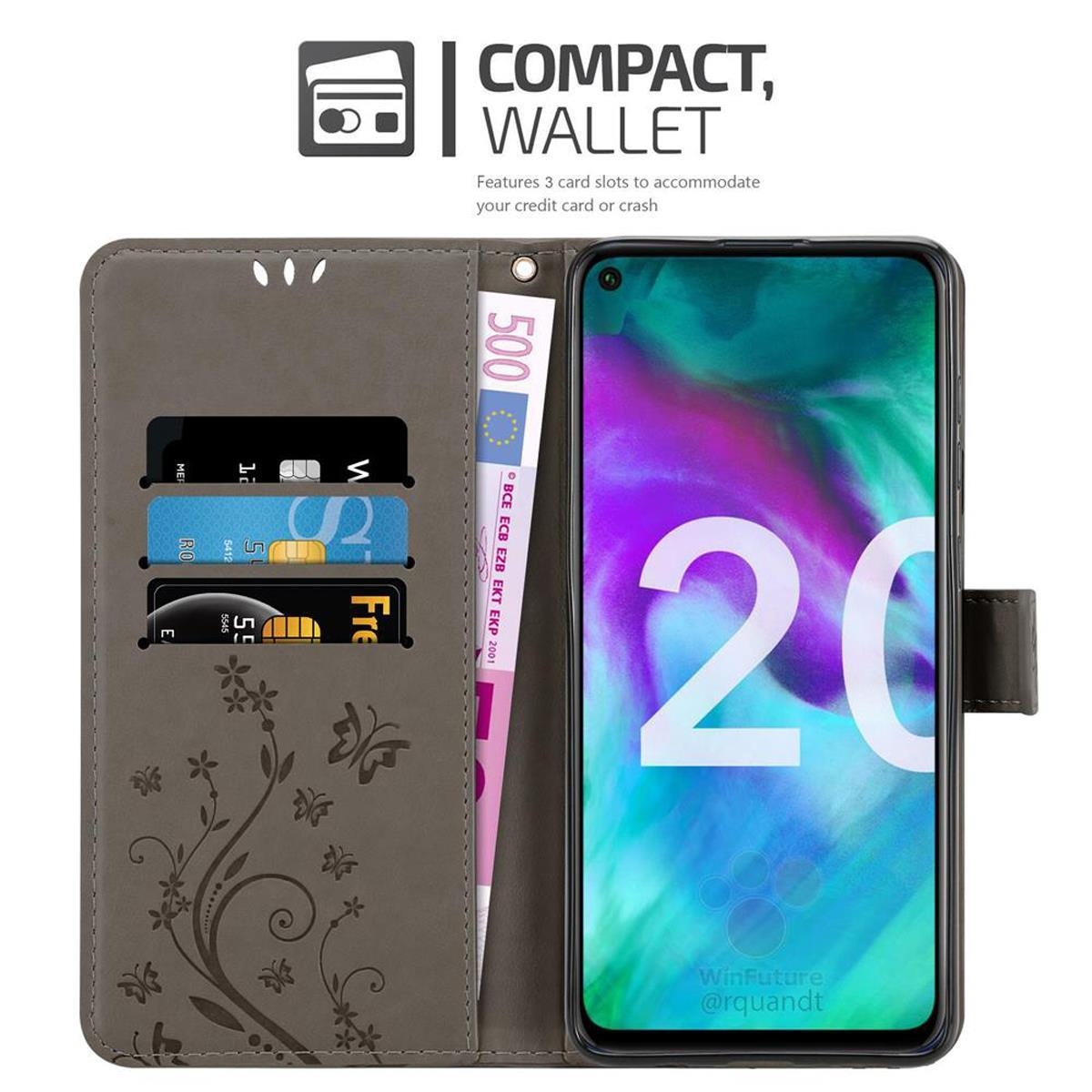 Eine braune Brieftasche mit Kartenfächern, Geld und einem Smartphone mit Blumendesign. Das Telefon hat ein farbenfrohes Display.