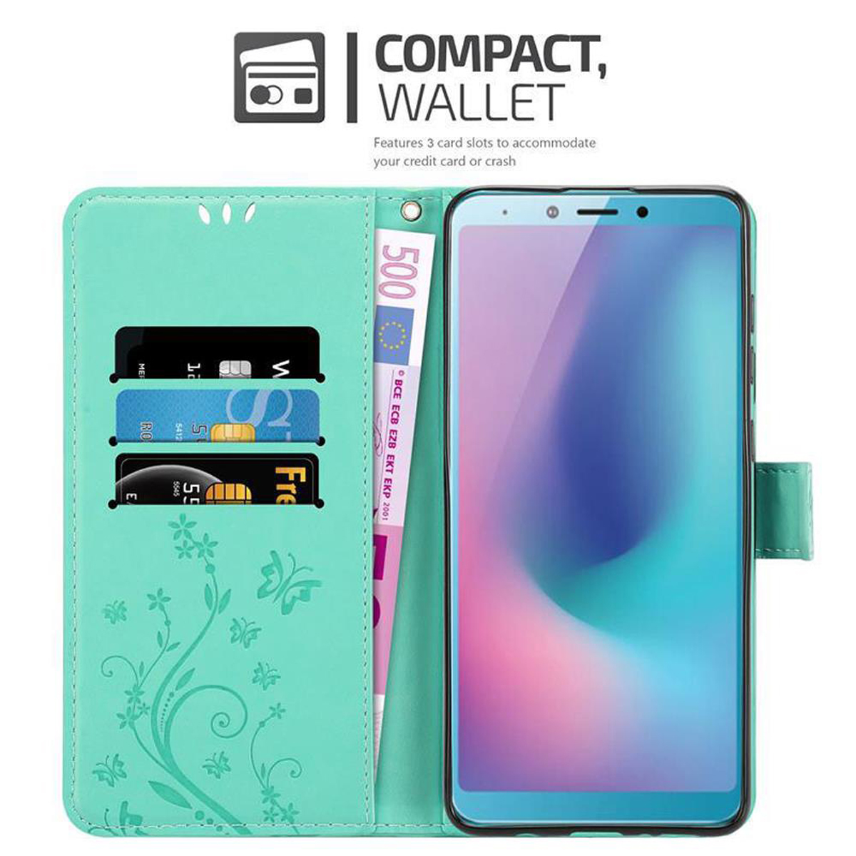 Custodia turchese aperta con denaro, carte e telefono.