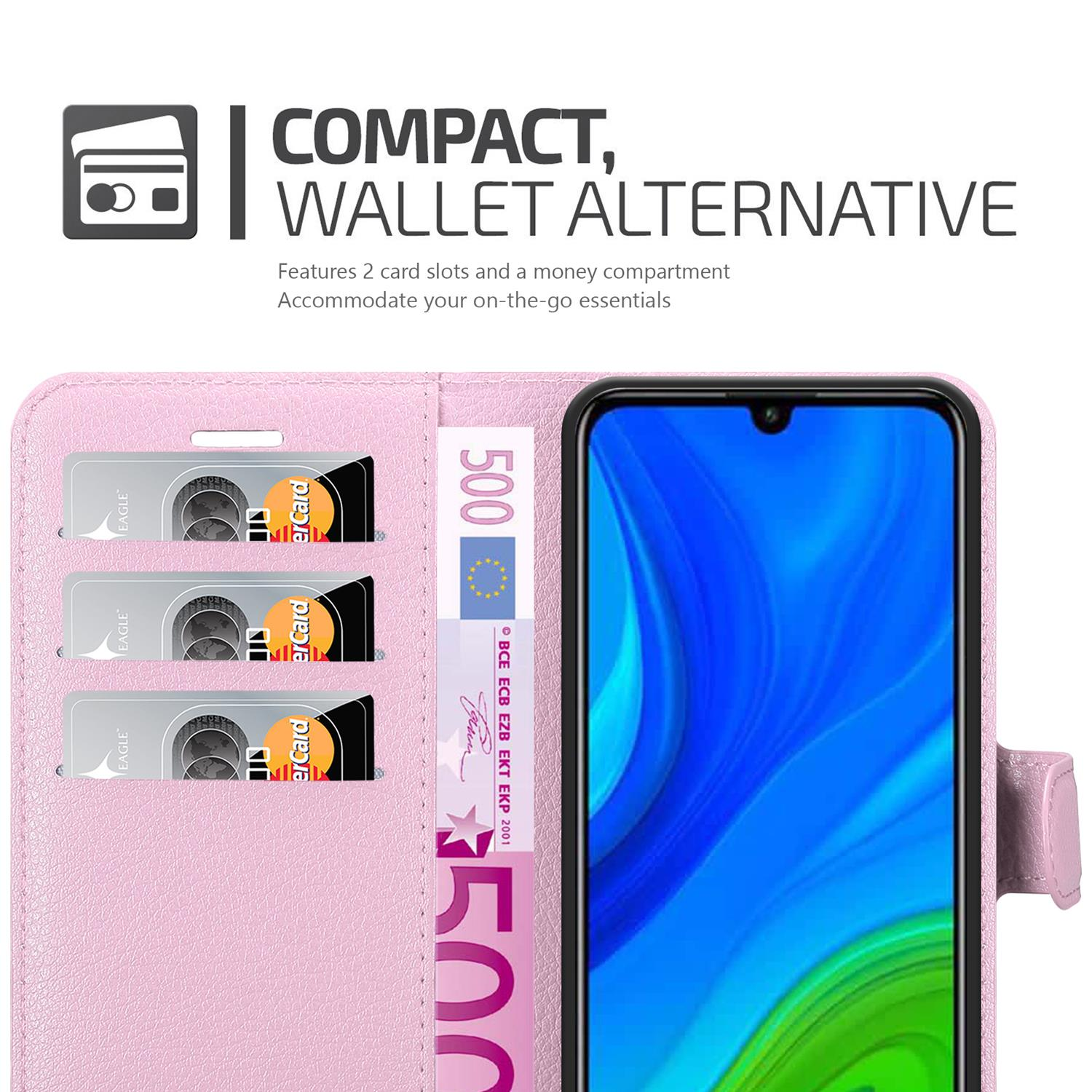 Custodia rosa aperta con telefono, carte e denaro all'interno.