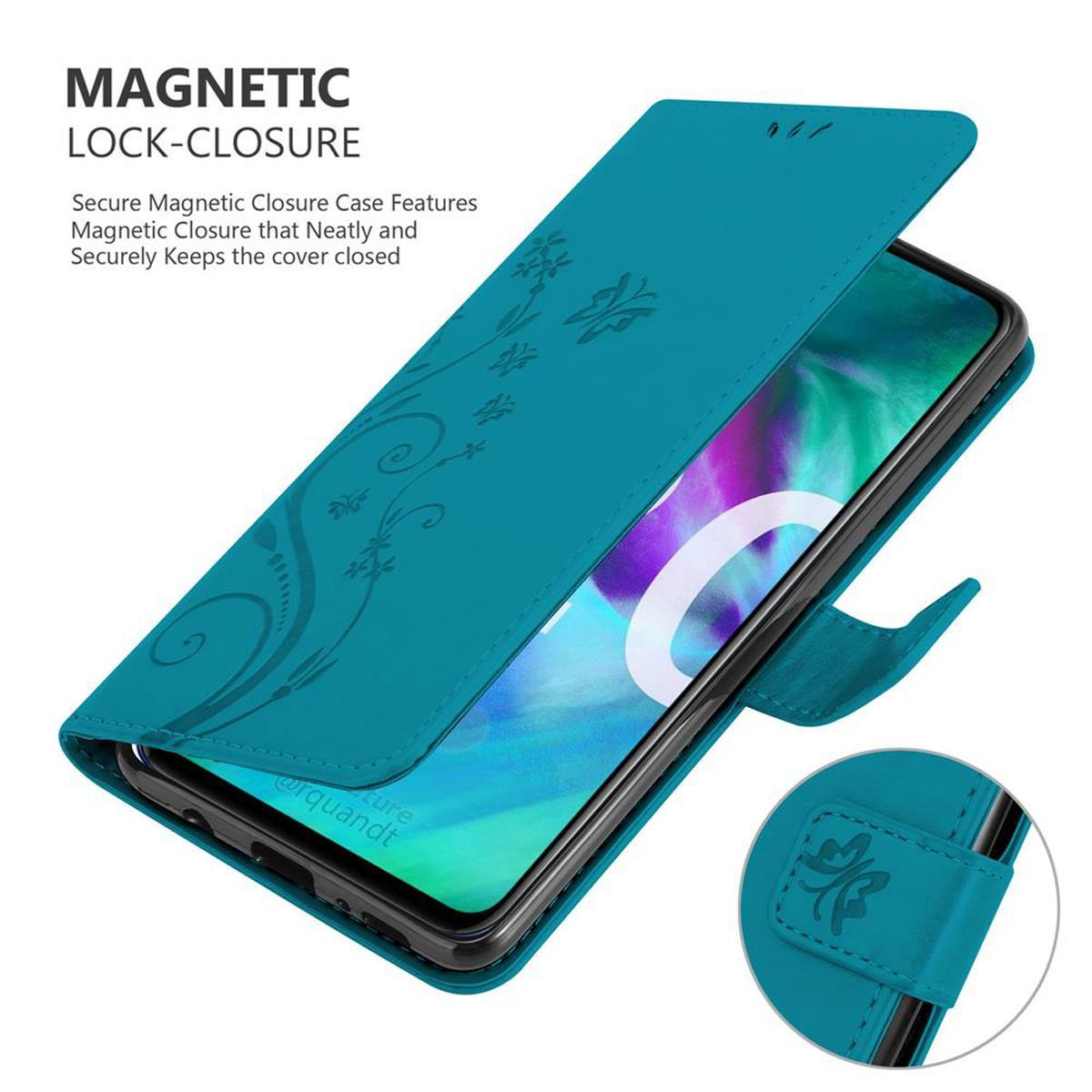 Türkisfarbene Handyhülle mit floralem Design, geschlossen. Text: Magnetverschluss.