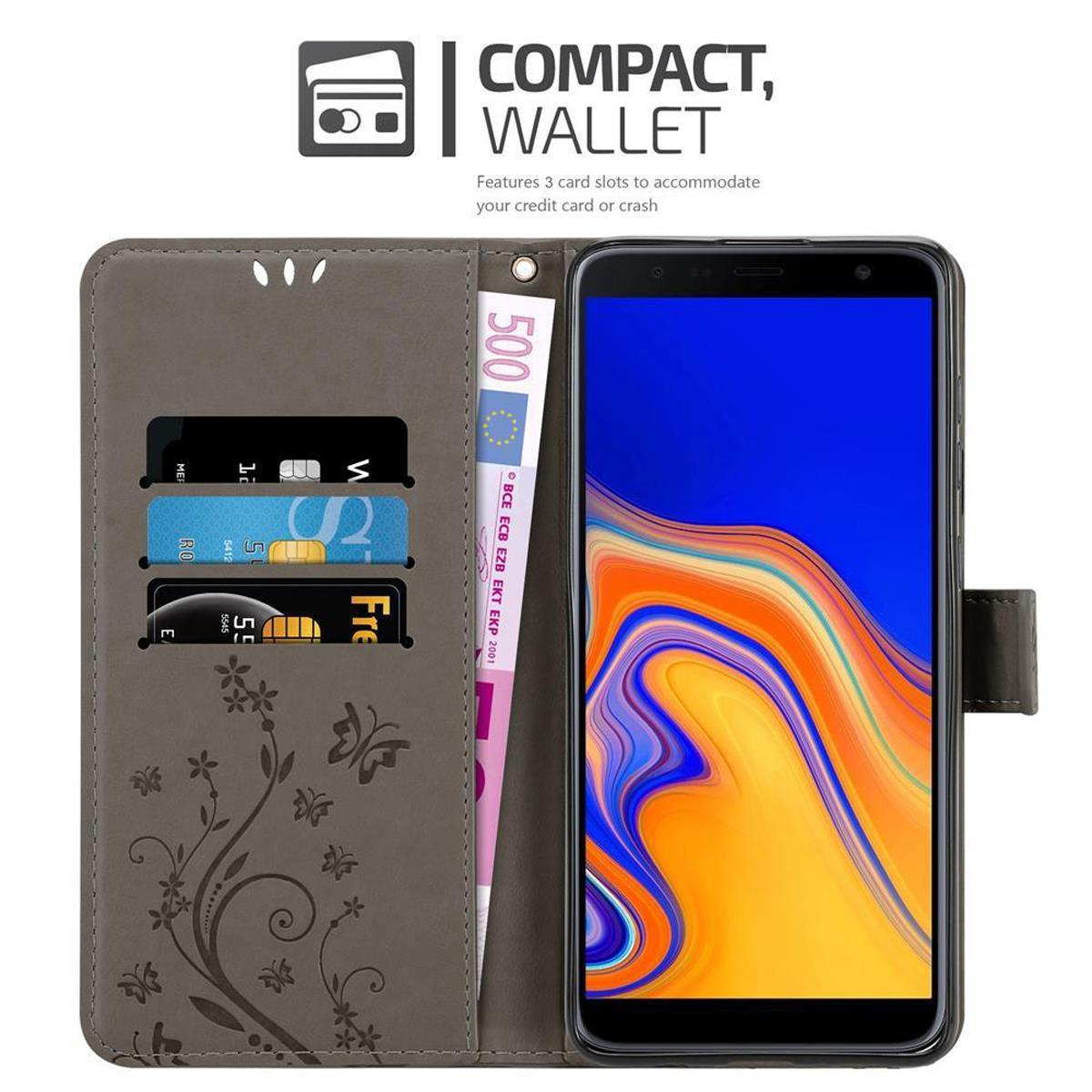 Custodia aperta per telefono con telefono, scomparti per soldi e carte, motivo floreale, colore marrone, sfondo bianco.