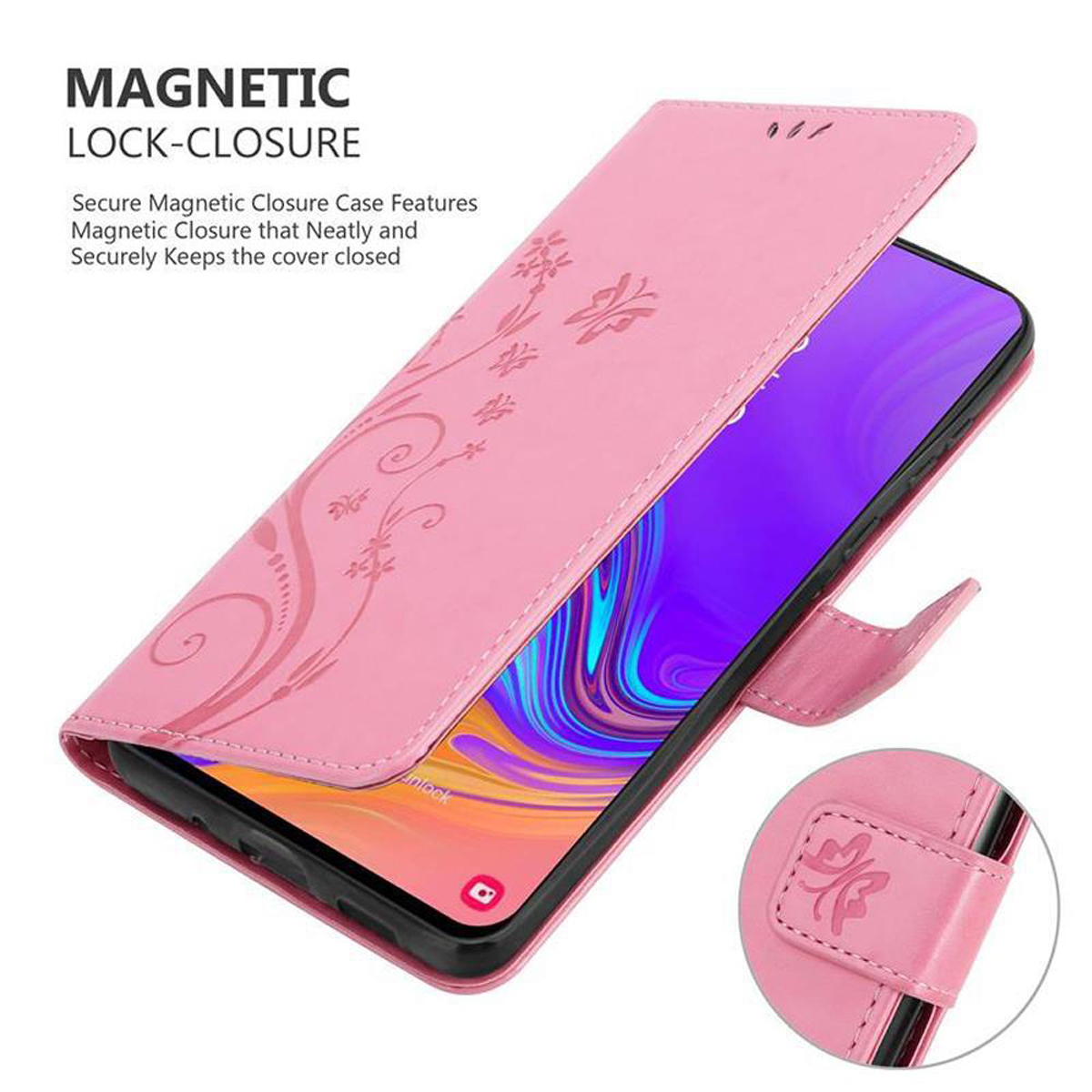 Custodia rosa per telefono aperta, telefono all'interno. Design floreale sulla custodia. Testo 'MAGNETIC LOCK-CLOSURE'.