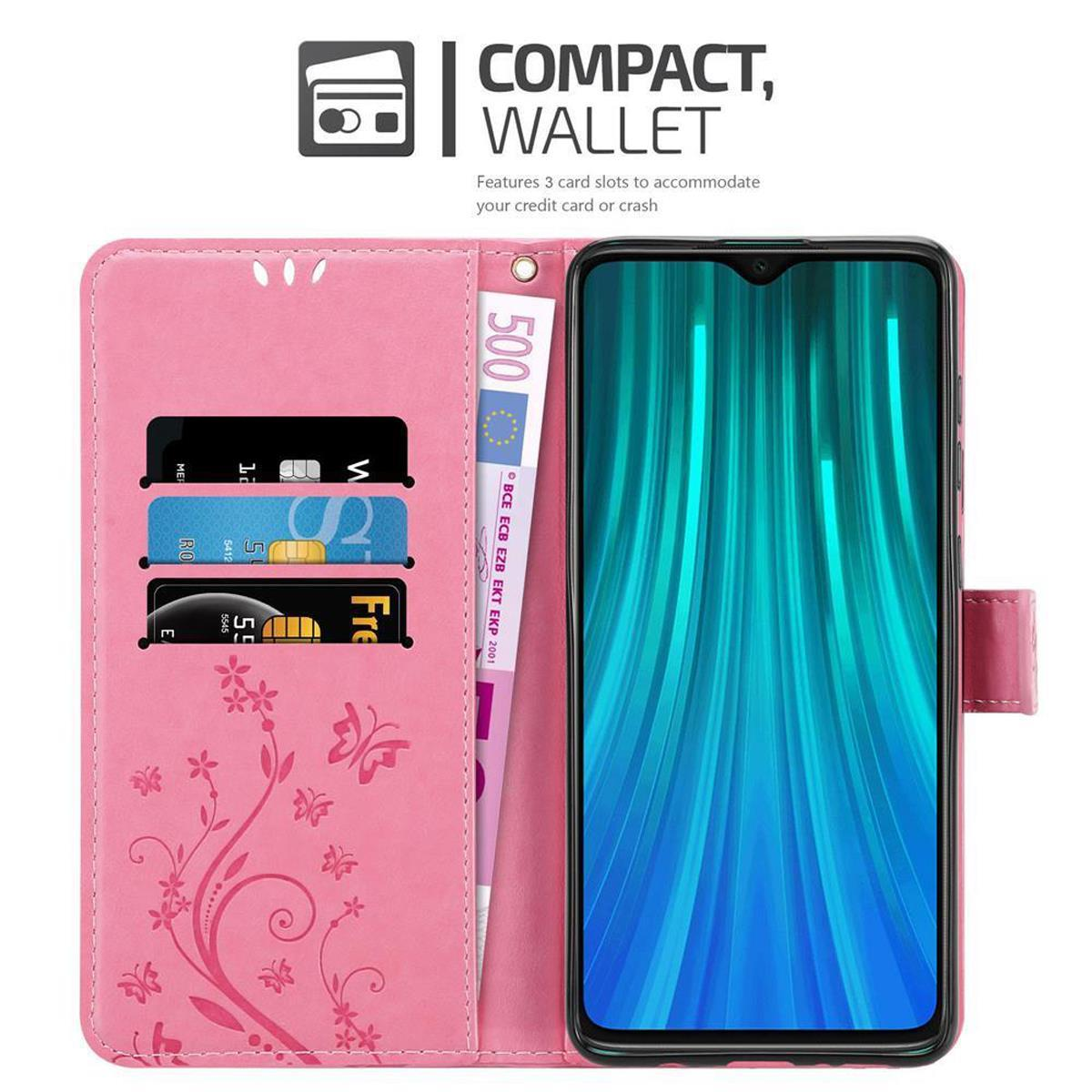 Eine rosa Handyhülle mit einem Telefon darin. Sie hat Kartenfächer und ein Geldfach. Das Telefon zeigt einen blauen Bildschirm.