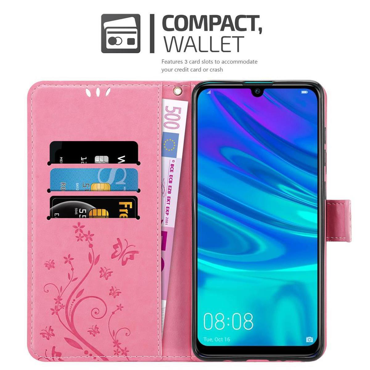 Custodia rosa con telefono. Custodia con carte e banconota da 500€. Design floreale.