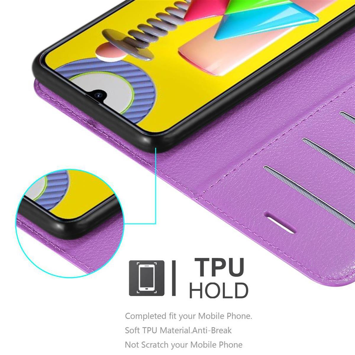 Una custodia per telefono viola con un telefono all'interno. La custodia ha la scritta: "TPU HOLD". Lo schermo ha un'immagine.