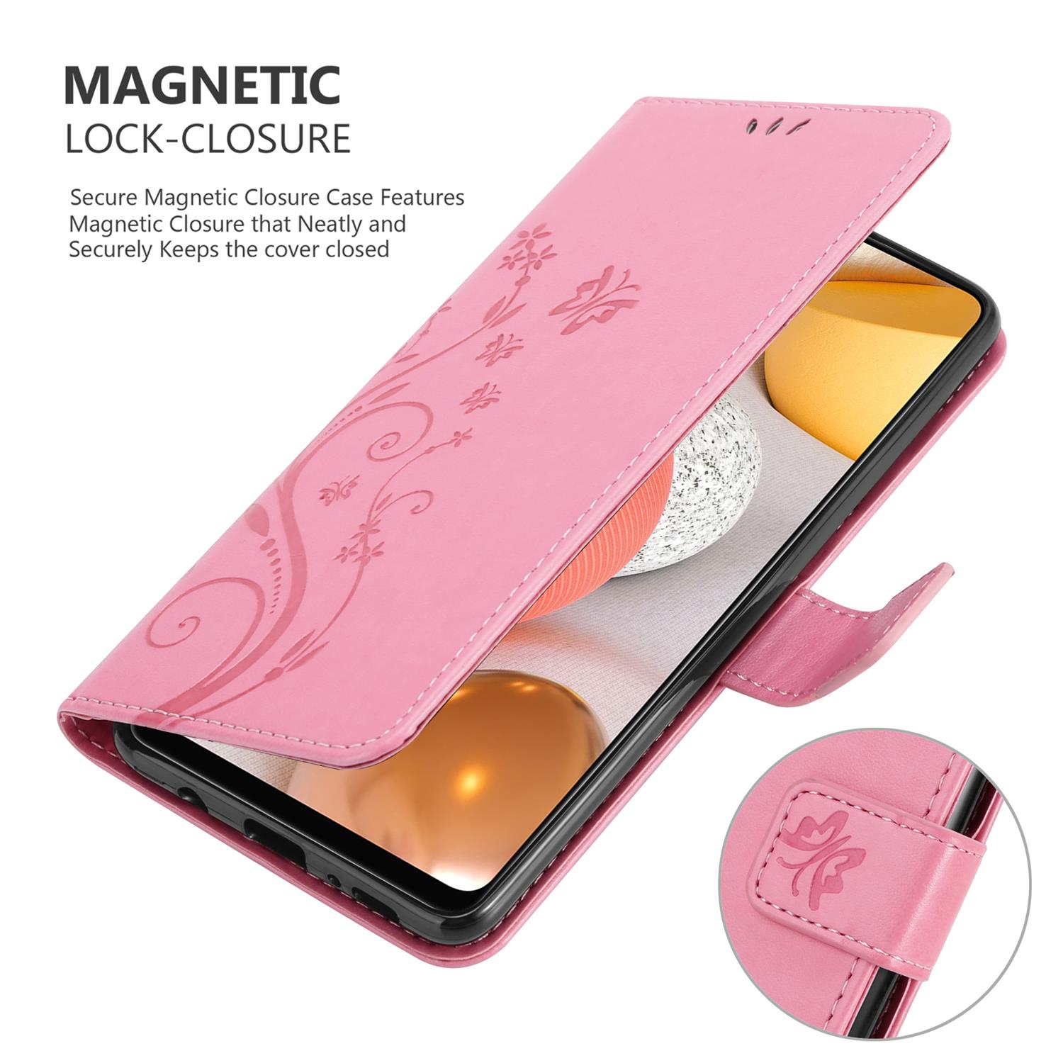 Custodia rosa per telefono con design floreale, aperta, che mostra un telefono. Un piccolo dettaglio di chiusura è visibile.