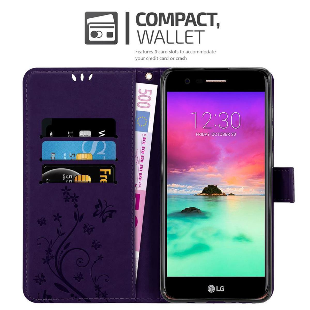 Custodia a portafoglio viola aperta con telefono, carte e banconota euro. Tramonto sul telefono.
