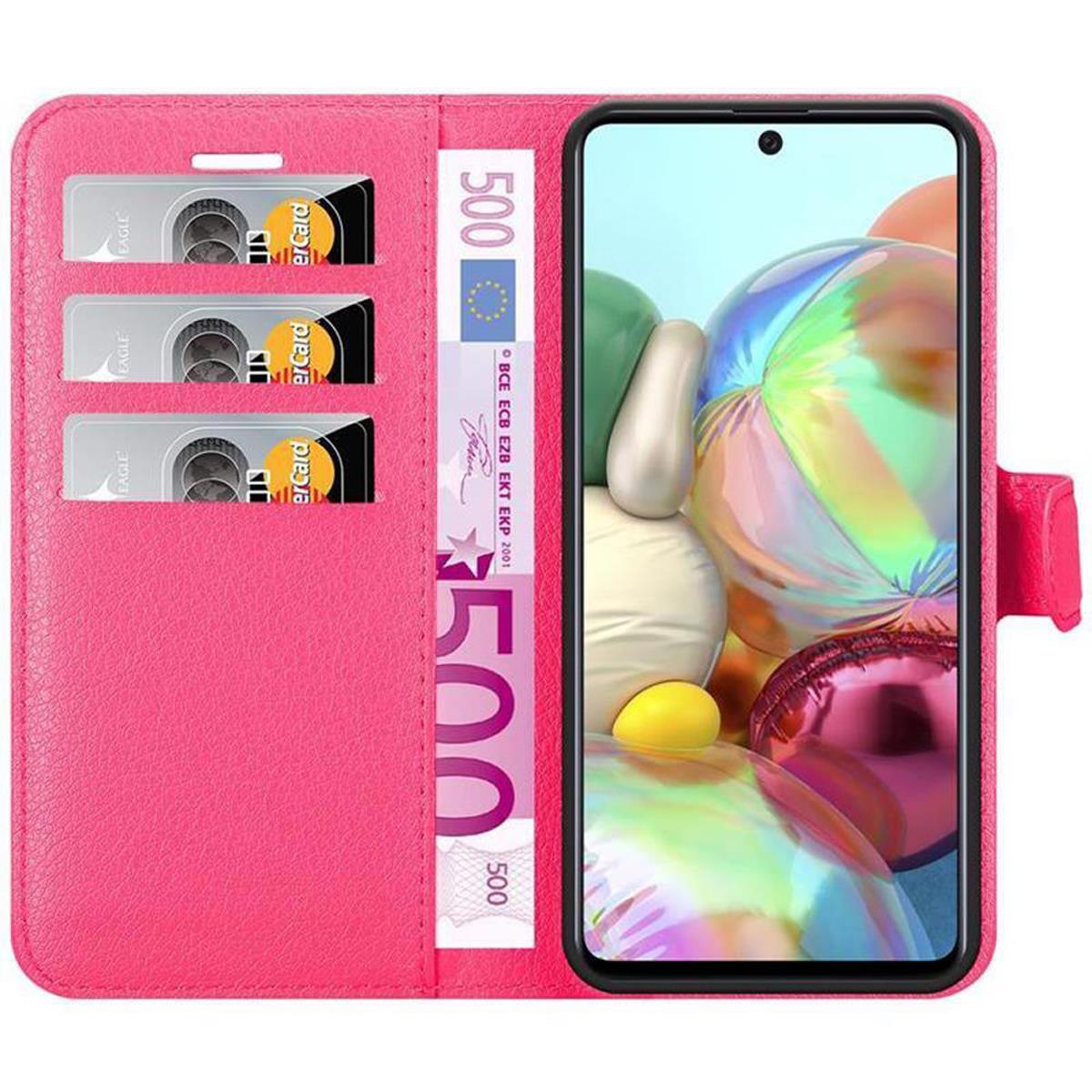 Custodia rosa per telefono, con carte di credito e denaro all'interno, telefono con schermo colorato. Testo: 500 Euro.