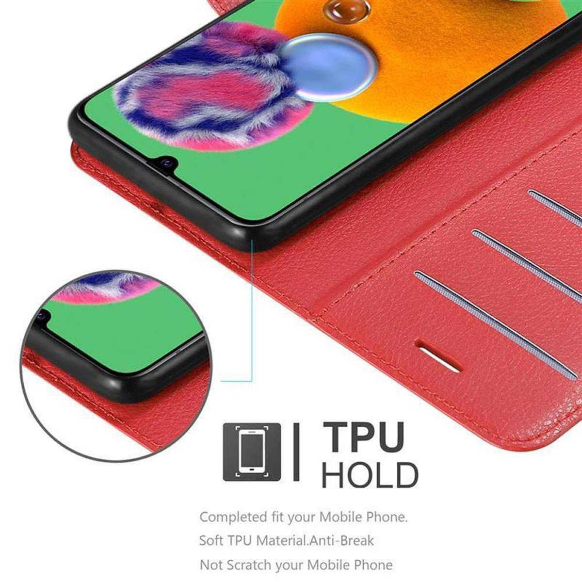 Telefono in custodia rossa con fessure per carte. Testo: TPU Hold. Vestibilità completa, materiale morbido, anti-rottura.