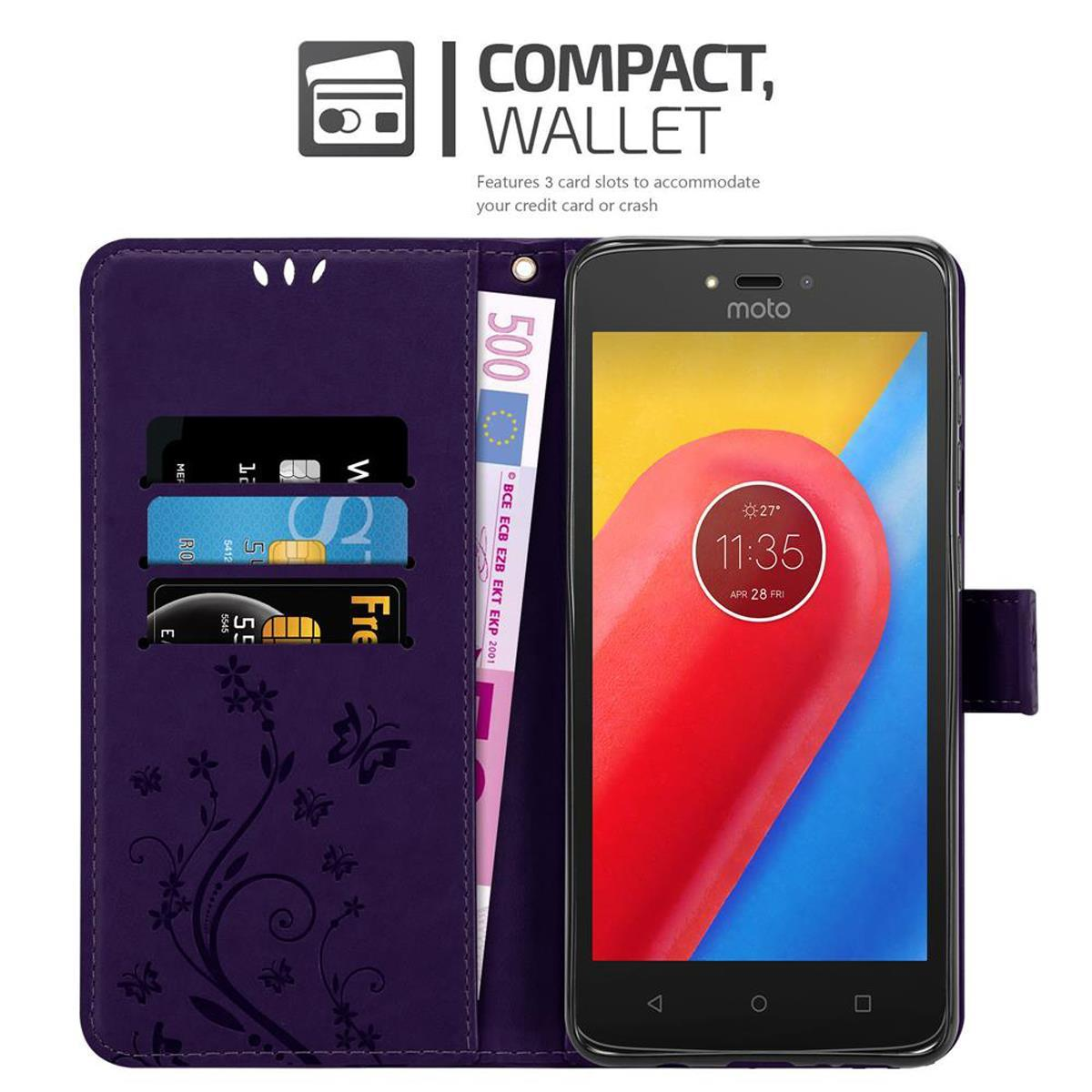 Custodia viola per telefono, aperta con telefono, carte e denaro, motivo floreale, sfondo bianco.