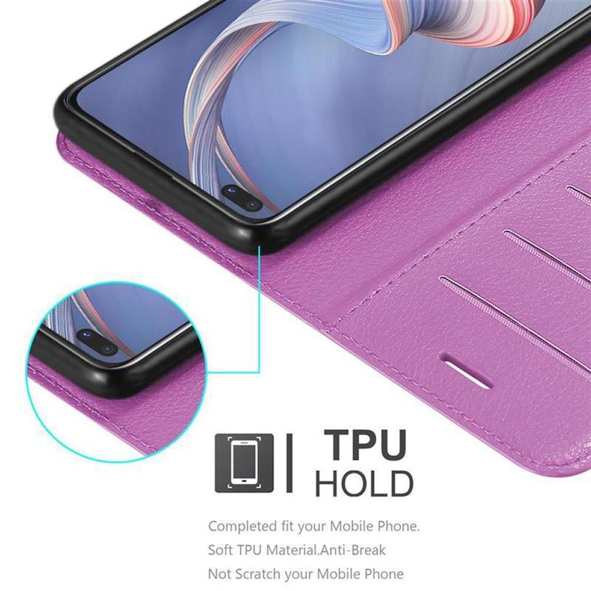Custodia viola con telefono. Testo: TPU HOLD. Mostra il telefono tenuto in posizione.