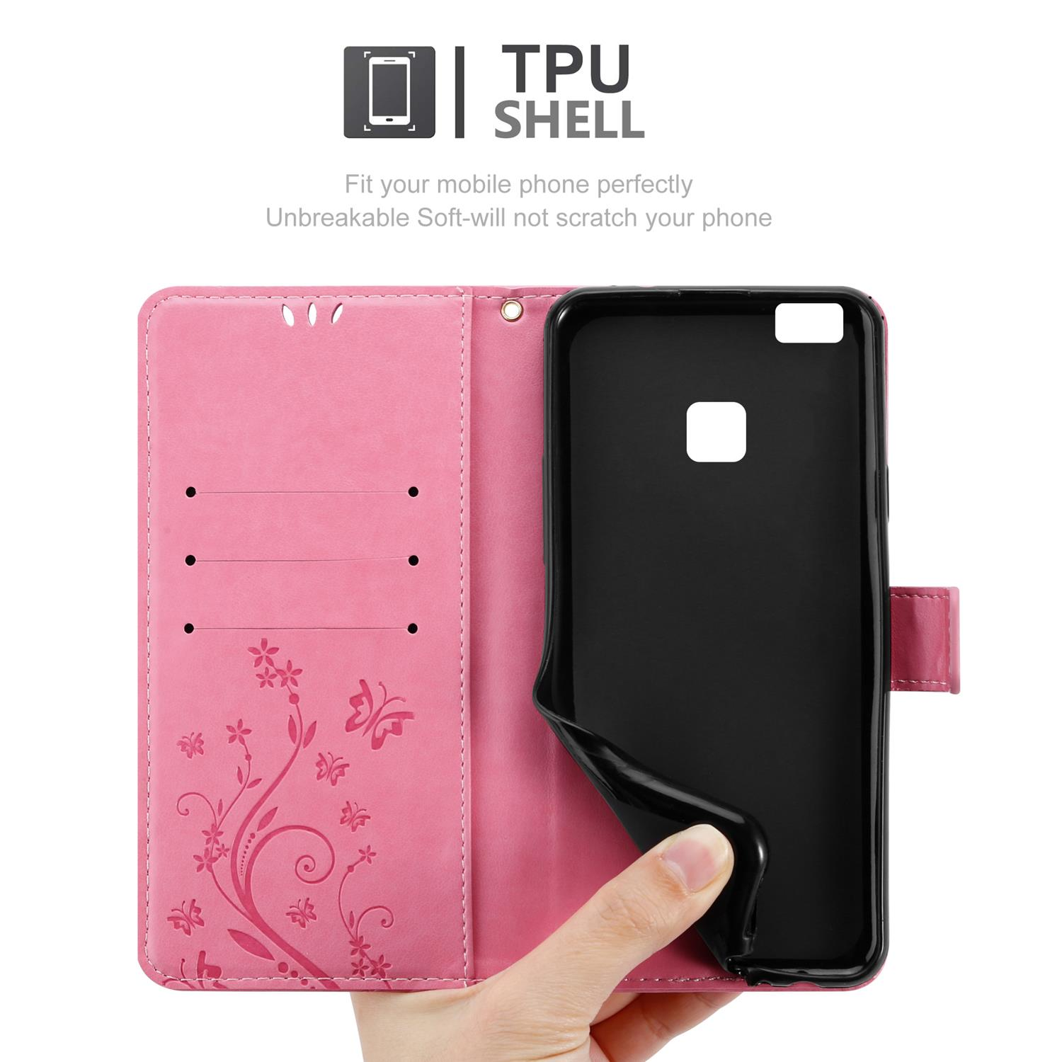 Custodia rosa per telefono con telefono nero all'interno. La custodia ha fessure per carte e un motivo floreale.