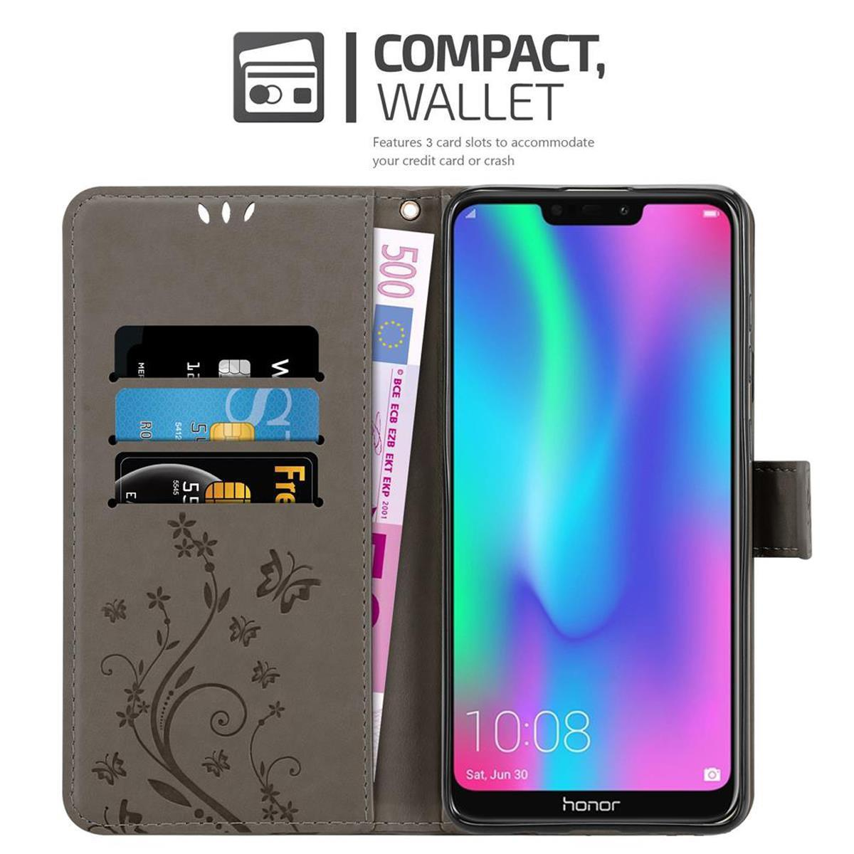 Custodia per telefono aperta con carte e denaro. Il telefono mostra uno schermo colorato.