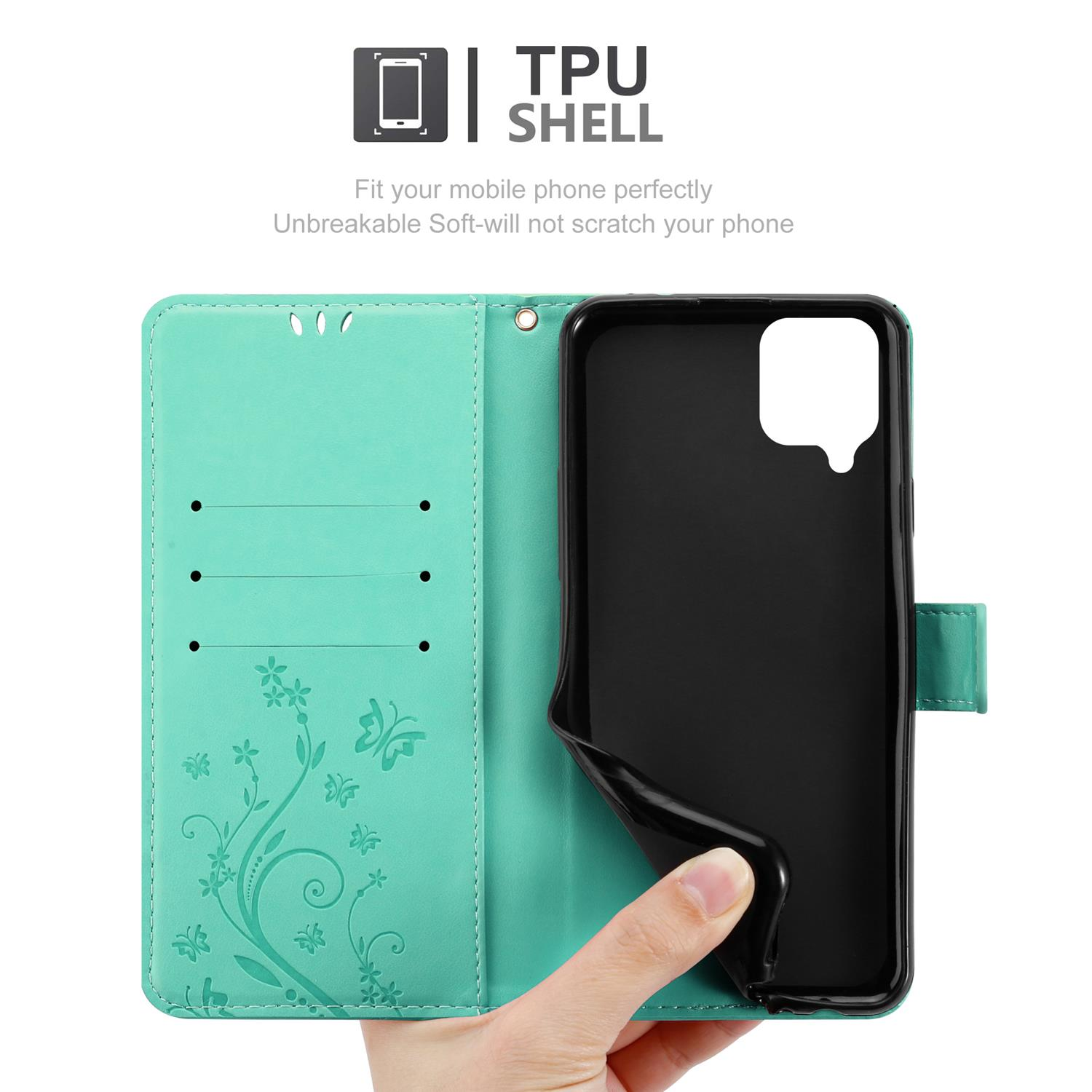 Custodia verde menta aperta. Telefono nero dentro. Mano che tiene la custodia. TPU visibile.