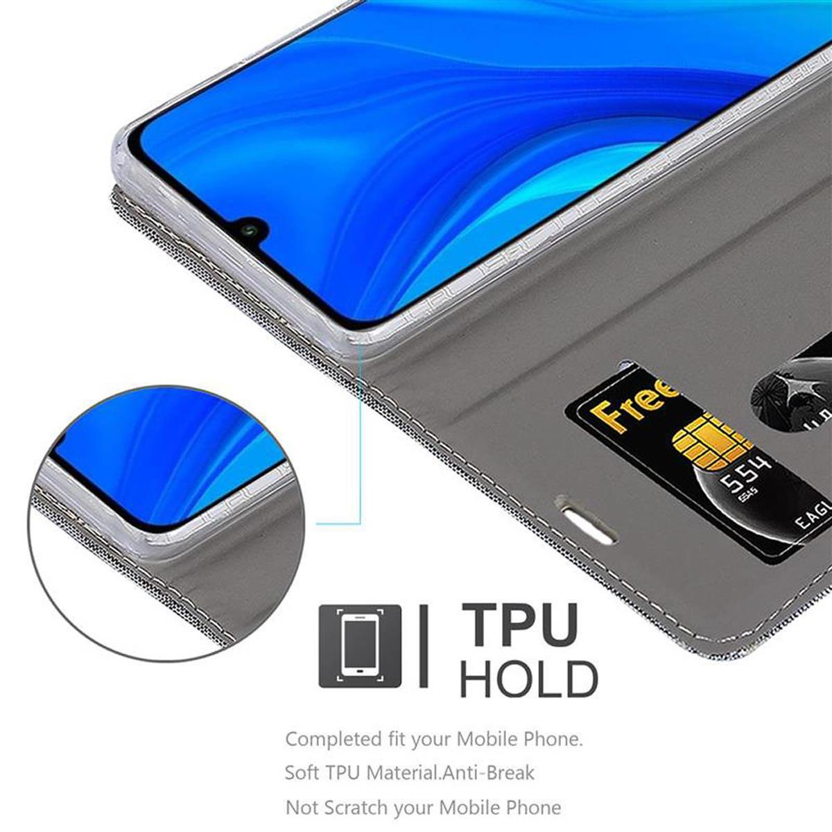 Custodia grigia per telefono con fessure per carte. Schermo del telefono visibile. Carta con dettagli dorati in vista.