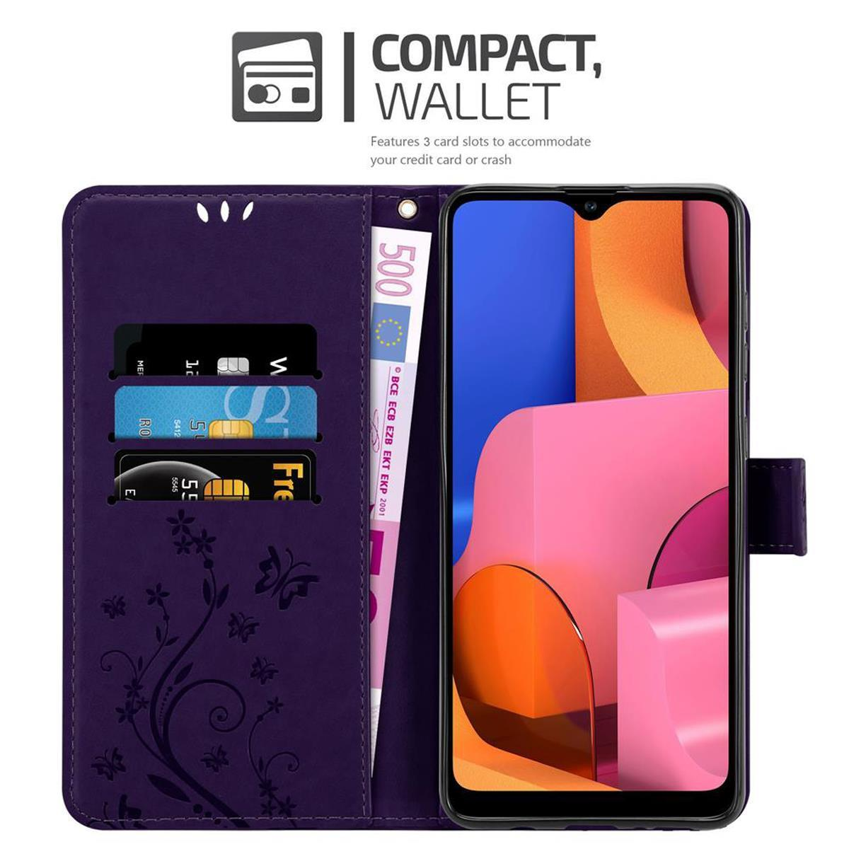 Custodia per telefono aperta con telefono, carte e banconota euro. La custodia è viola scuro con fiori.