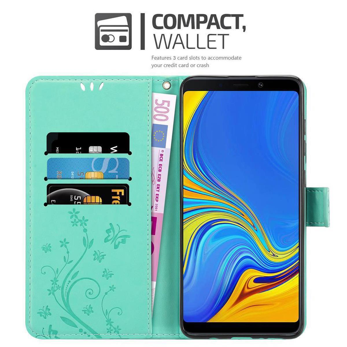 Custodia per telefono verde menta con scomparti per carte e smartphone. Il testo recita 'COMPACT, WALLET'.