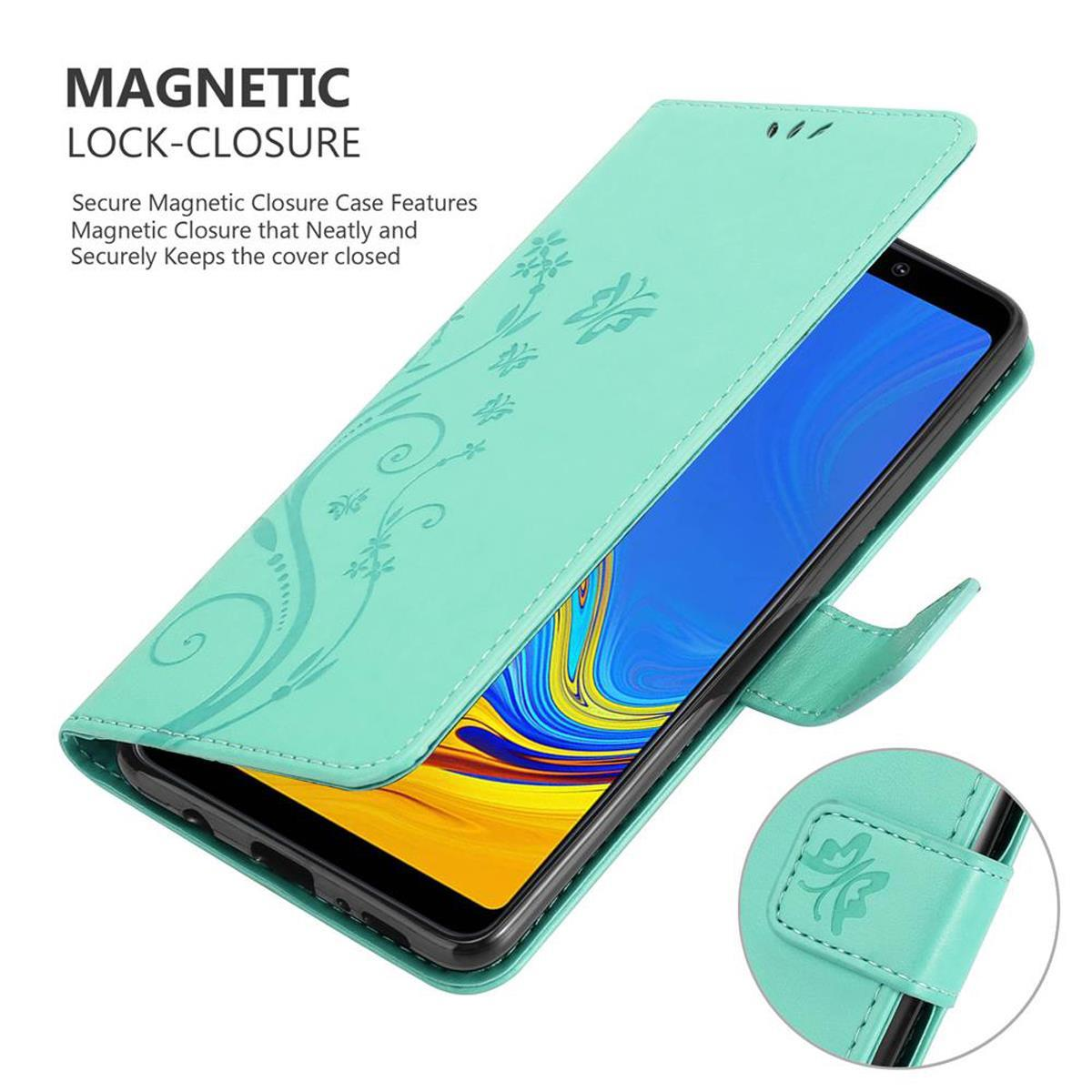 Custodia verde con telefono. Design floreale sulla cover. Chiusura magnetica.