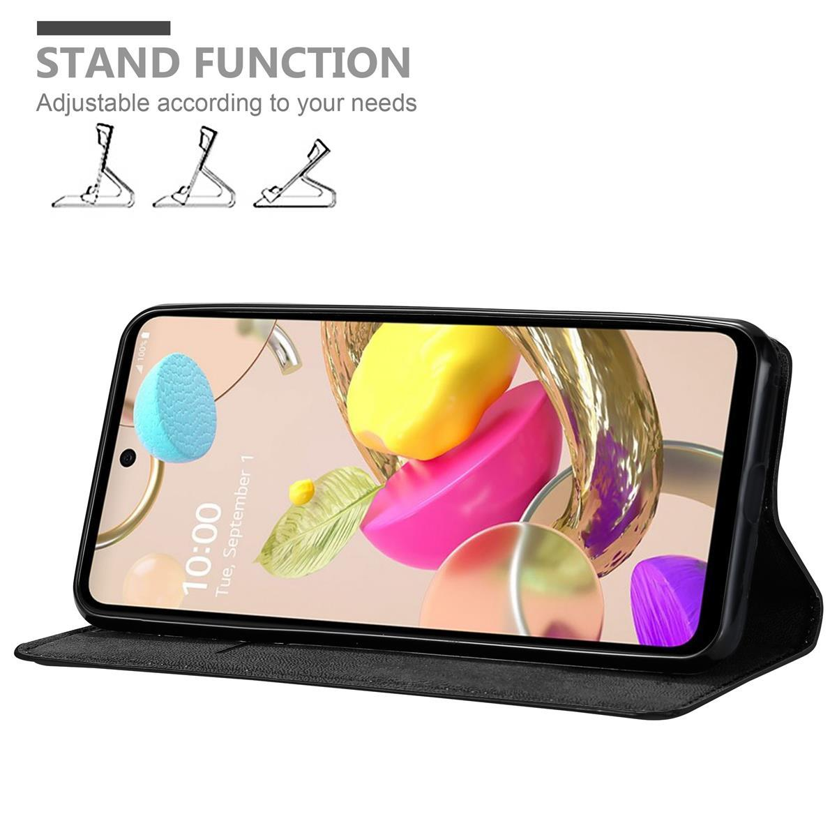 Schwarze Handyhülle mit Telefon, das abstrakte Formen zeigt. Text: Standfunktion. Einstellbar.