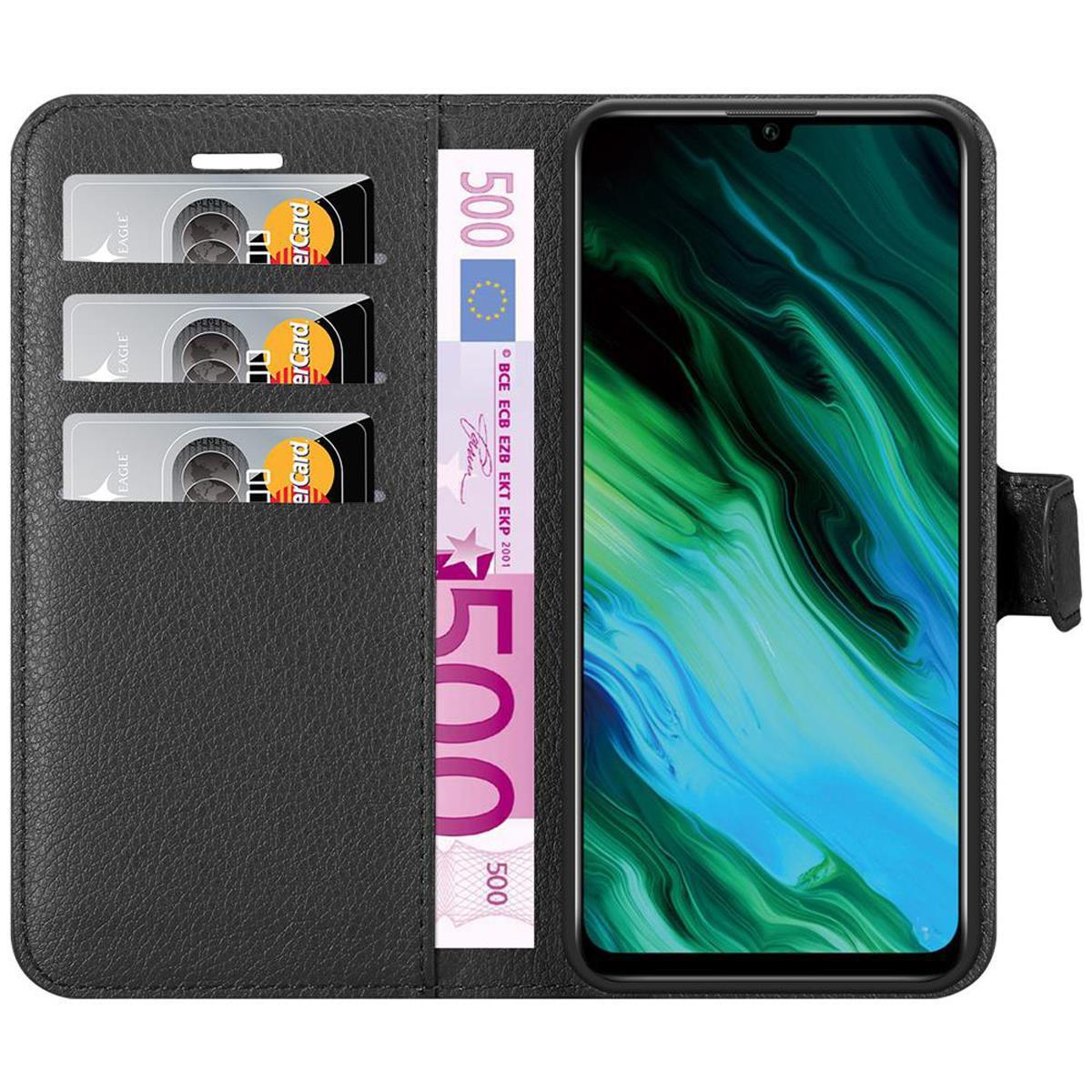 Telefono in custodia nera, soldi e carte di credito visibili.