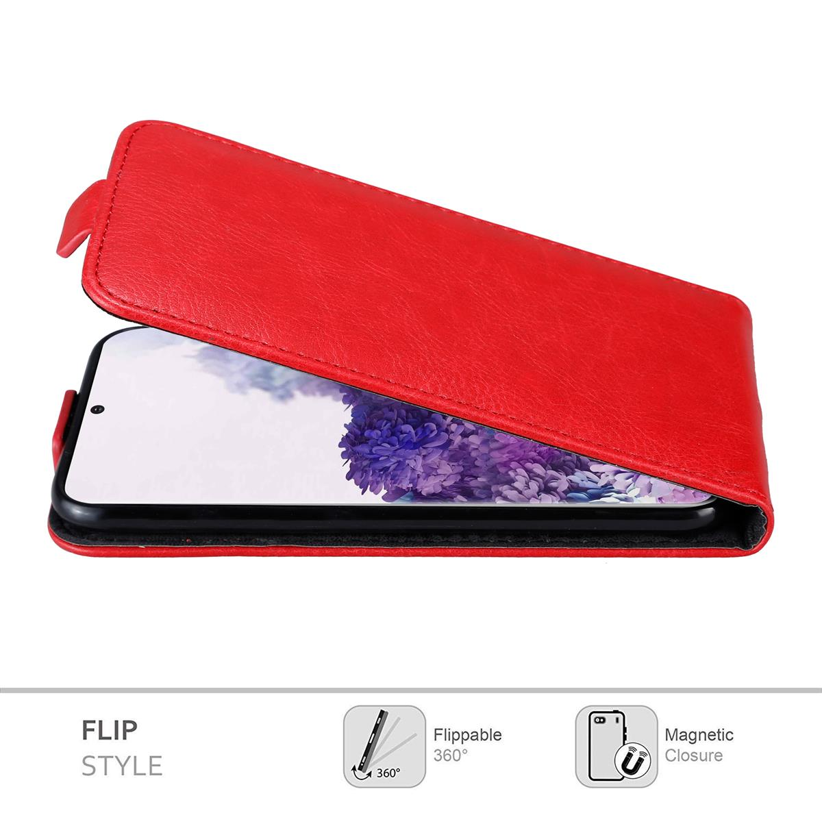 Custodia rossa, telefono dentro. Mostra lo stile flip con chiusura magnetica.