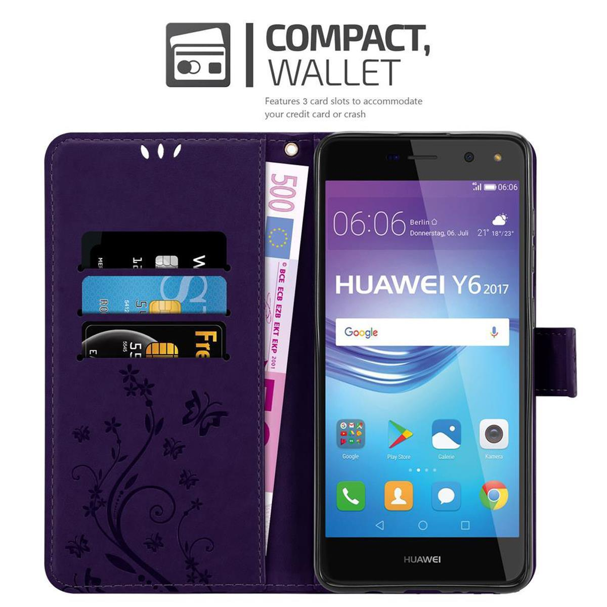 Custodia per telefono viola con carte e denaro. Un telefono mostra l'ora.
