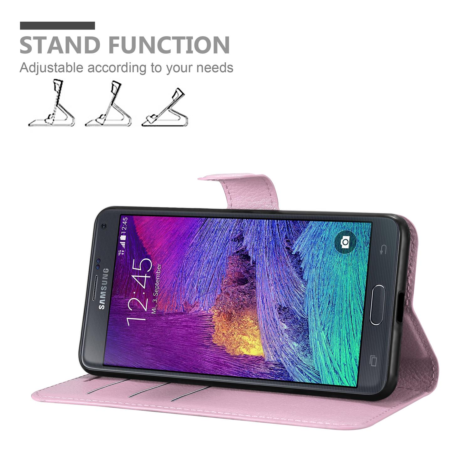 Rosa Handyhülle mit Handy, mit Standfunktion. Text: Standfunktion, an Ihre Bedürfnisse anpassbar.