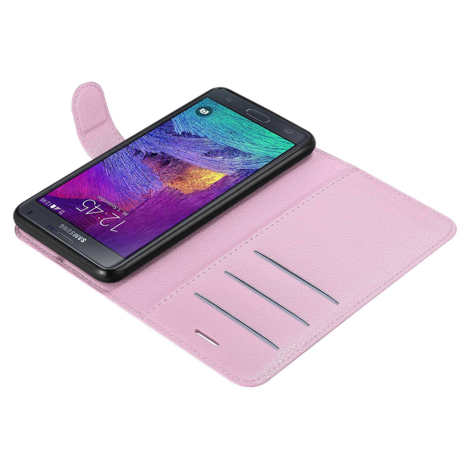 Rosa Handyhülle offen mit einem Telefon darin. Der Telefonbildschirm ist an und zeigt ein farbenfrohes Bild.