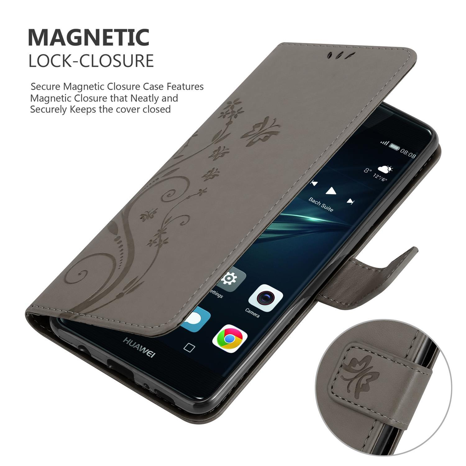 Graue Handyhülle mit Telefon. Die Hülle hat ein florales Design. Weißer Hintergrund.