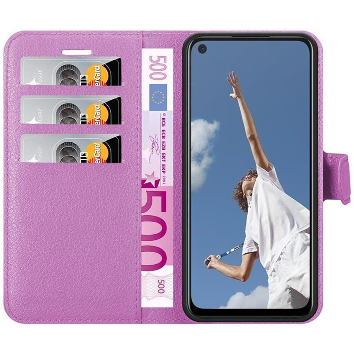Portafoglio per telefono viola con carte di credito e una banconota da 500 euro. Persona sullo schermo.