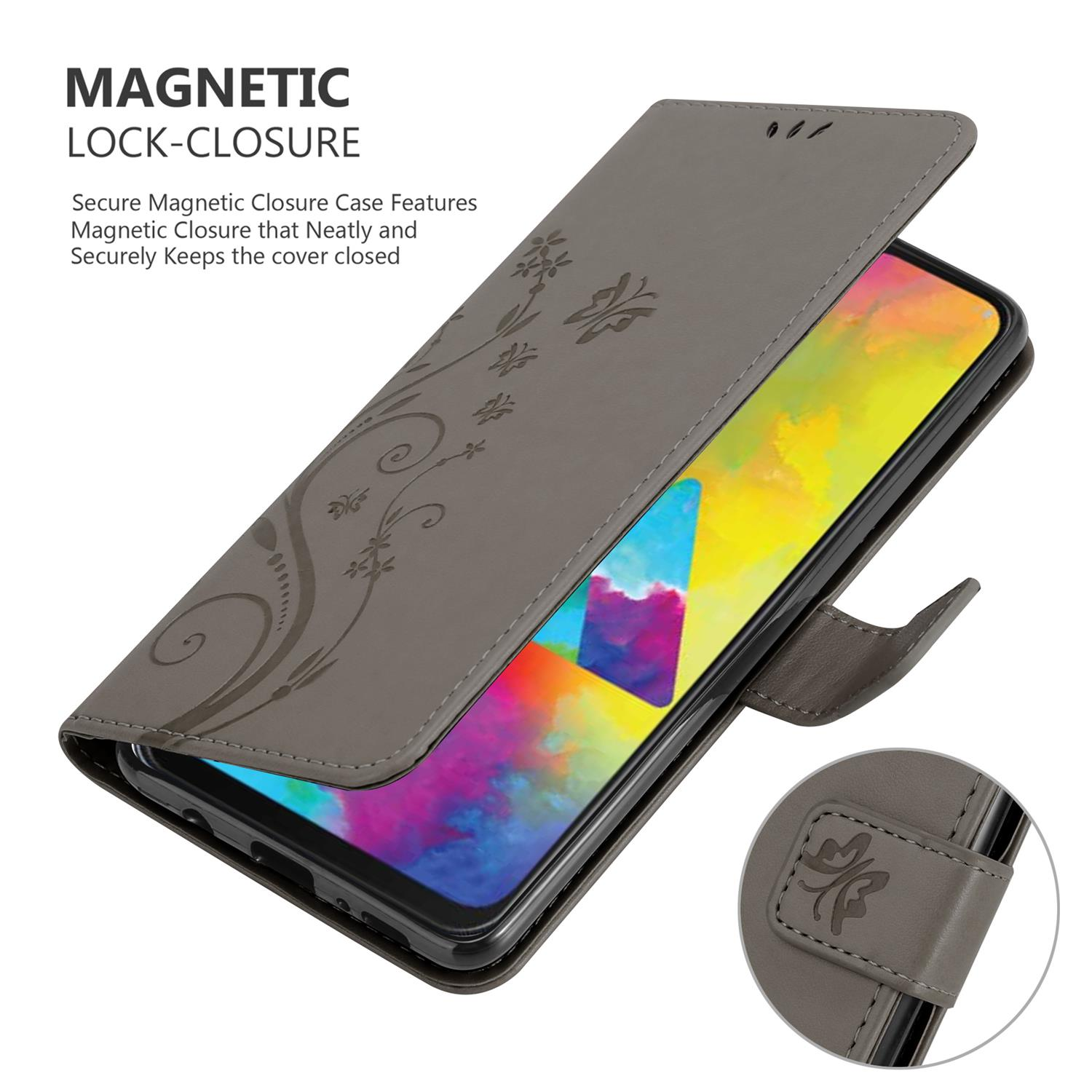 Custodia grigia per telefono aperta, con design floreale. Lo schermo del telefono mostra colori astratti. Chiusura magnetica presente.