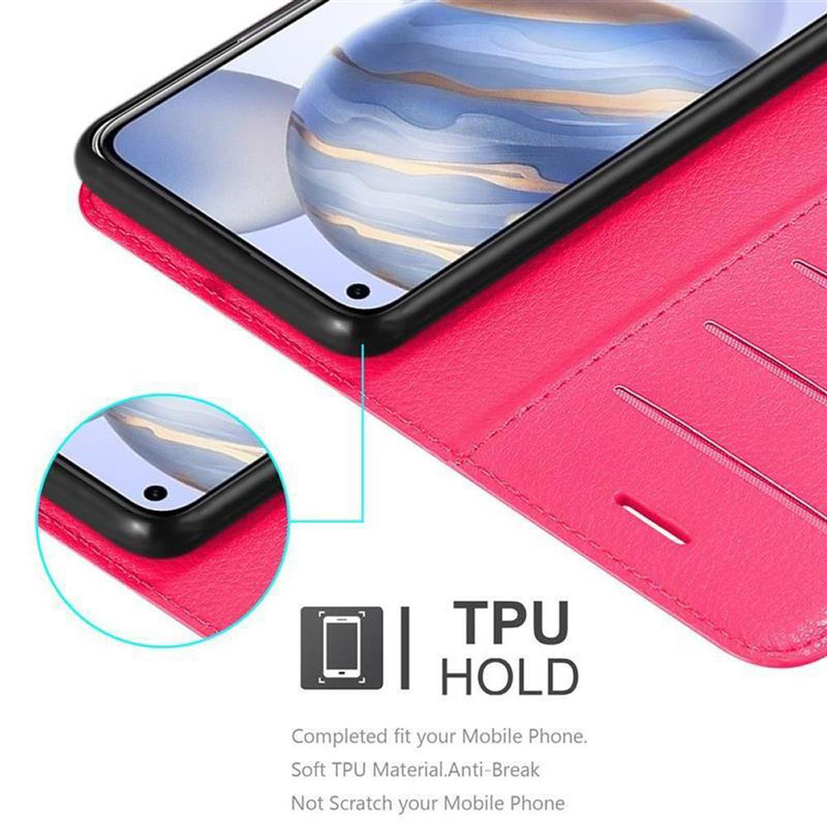 Primo piano di una custodia per telefono. Bordo del telefono nero, custodia rosa e testo 'TPU HOLD'.