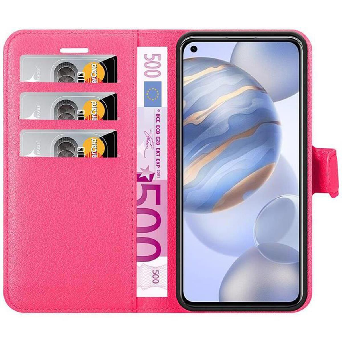 Custodia rosa per telefono con un telefono all'interno. Il telefono mostra carte e denaro e ha fessure per carte.