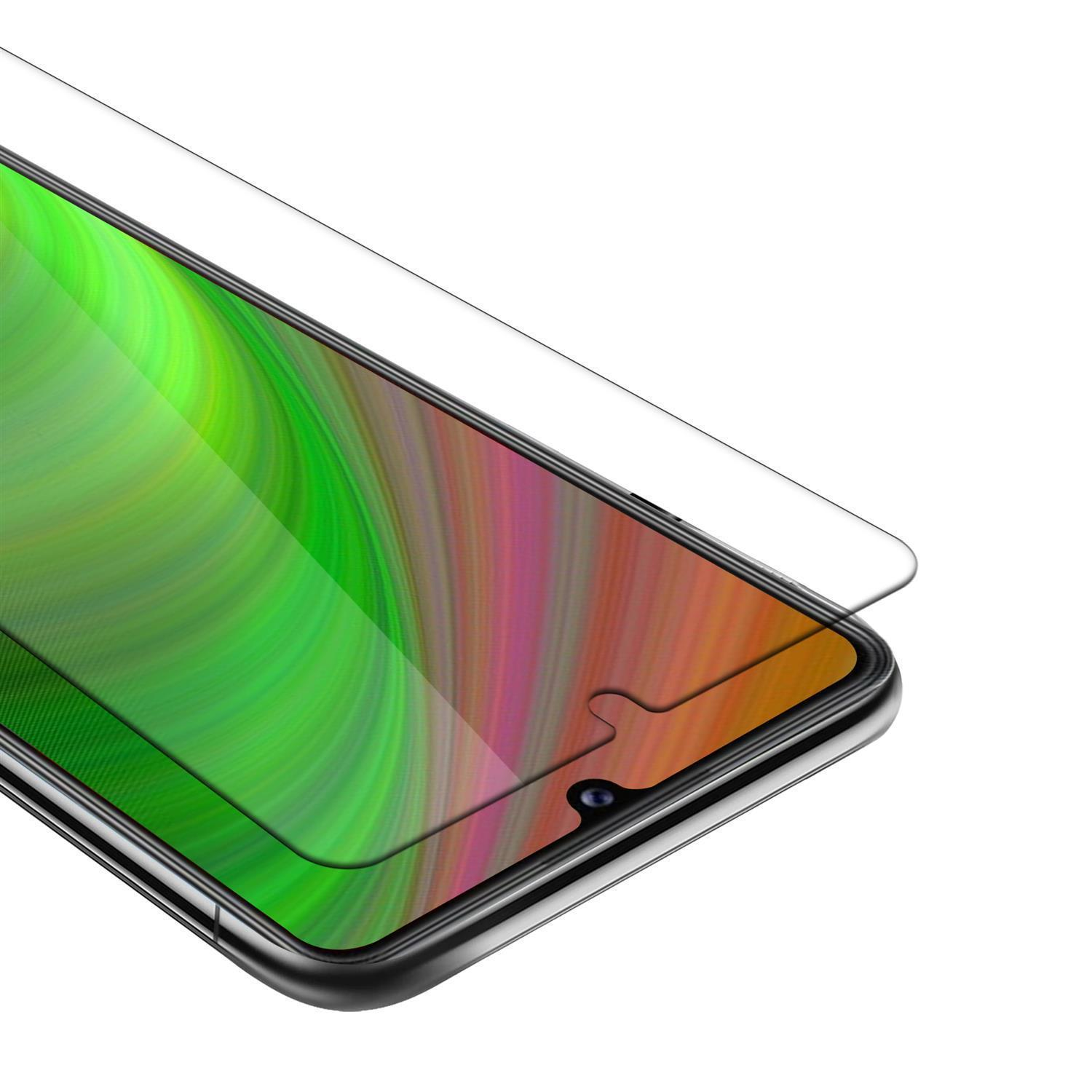 Schermo di smartphone con protezione schermo applicata. Lo schermo mostra un design astratto colorato.