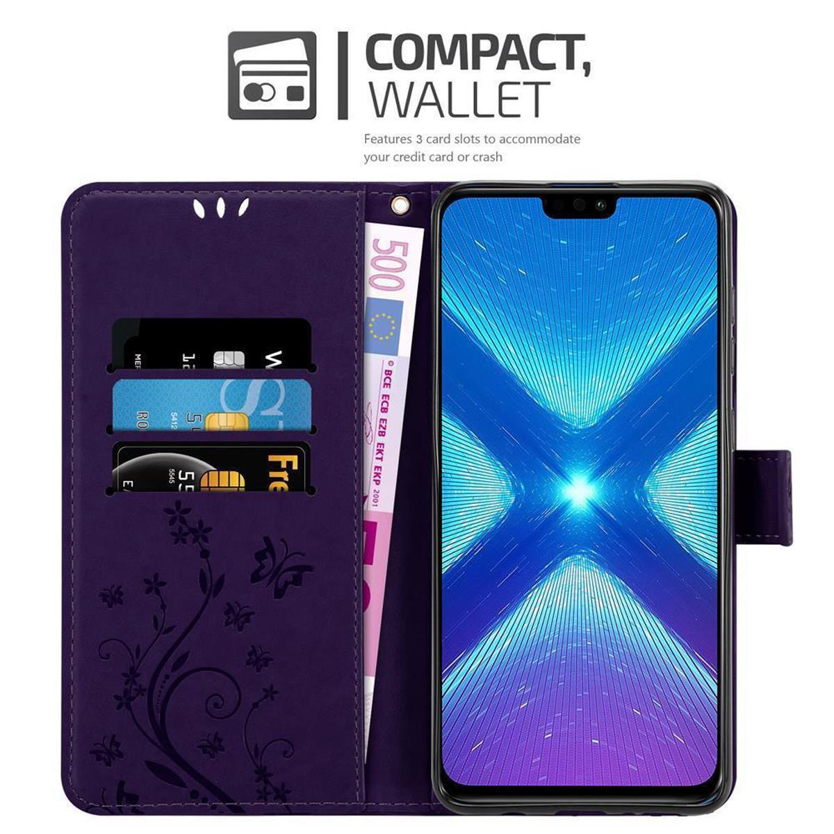 Portafoglio viola per telefono con carte di credito e telefono. Banconota da 500 euro visibile. Portafoglio compatto.