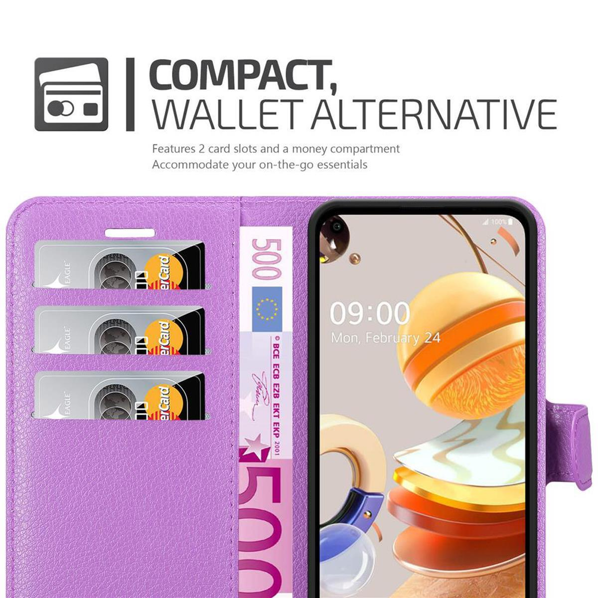 Una custodia per telefono viola con un telefono, carte di credito e denaro. La custodia è aperta.