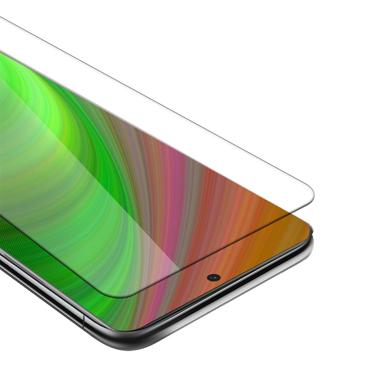 Un telefono con una protezione per lo schermo. Lo schermo mostra modelli astratti colorati. I bordi sono visibili.
