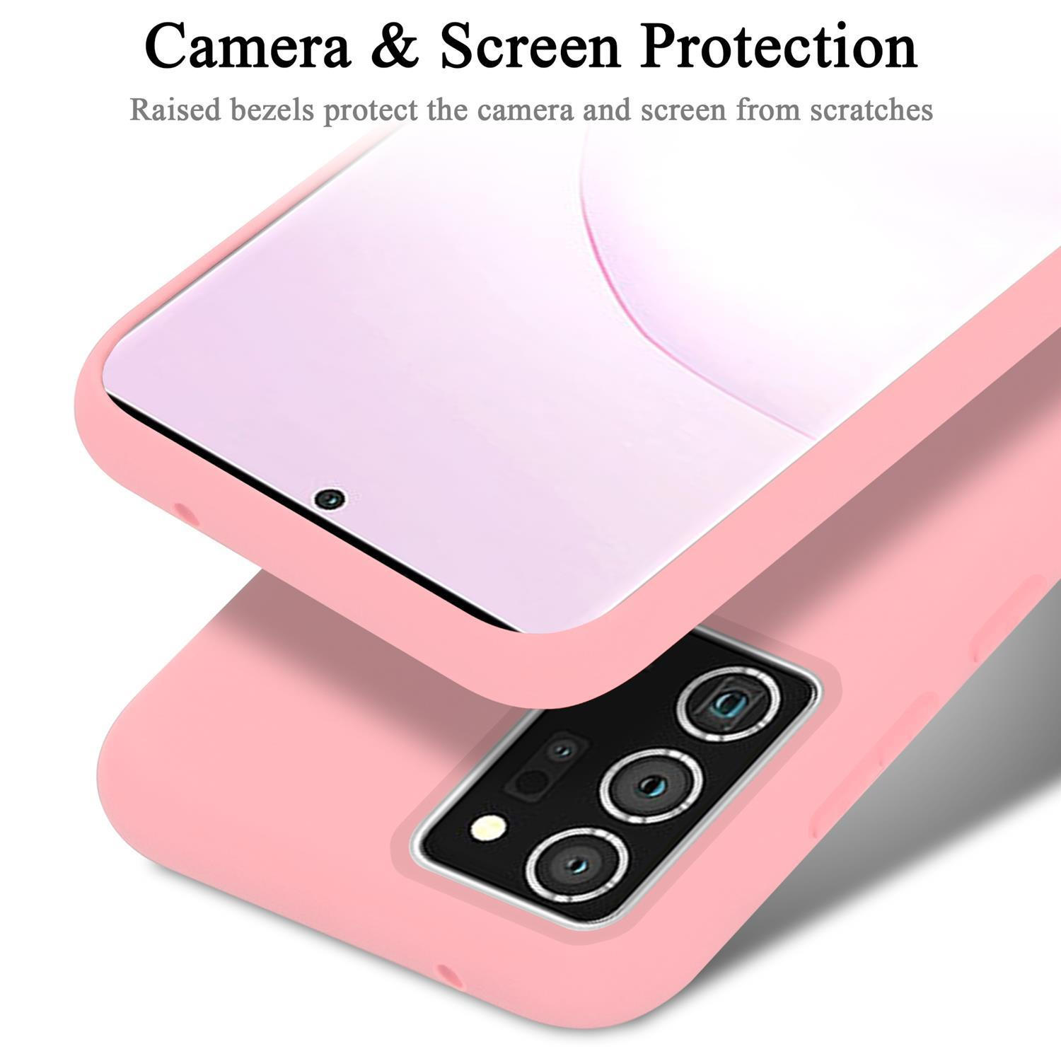 Custodia rosa per telefono protegge il telefono. Testo: Protezione fotocamera e schermo. I bordi rialzati proteggono.