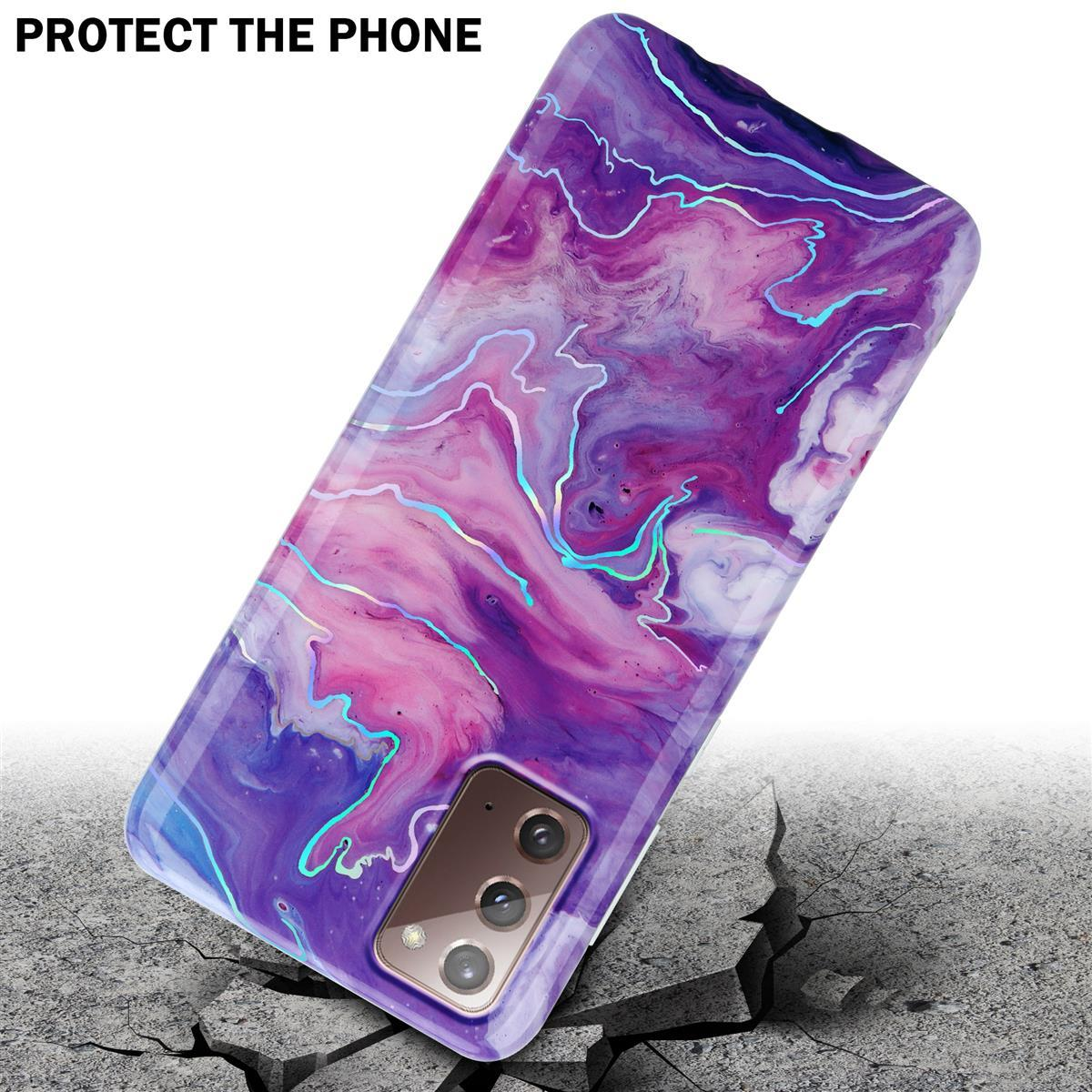 Custodia per telefono con design a marmo viola e blu. Il telefono è su una superficie incrinata.