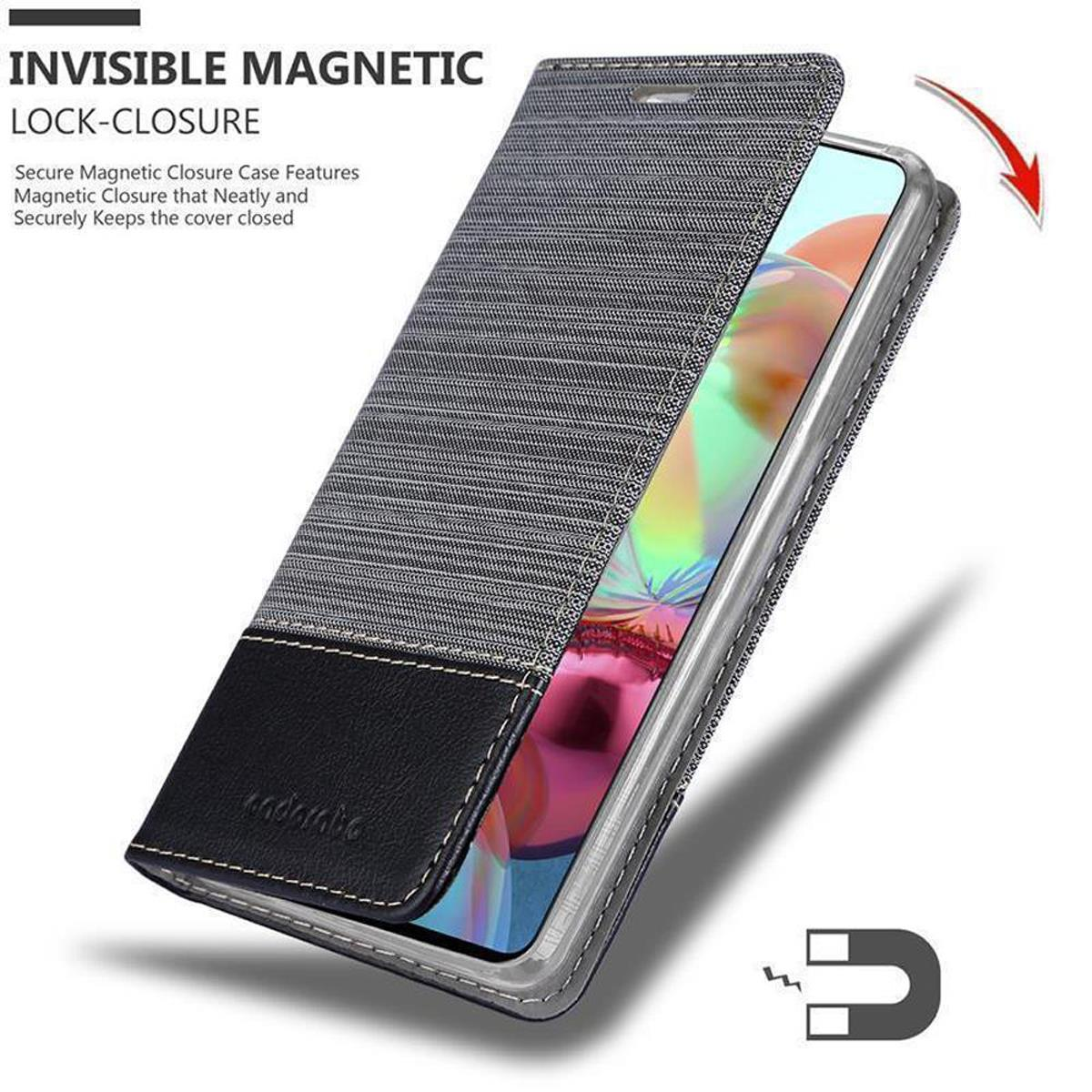Telefon in einer Hülle mit Magnetverschluss. Die Hülle ist offen und grau. Der Magnet ist sichtbar.