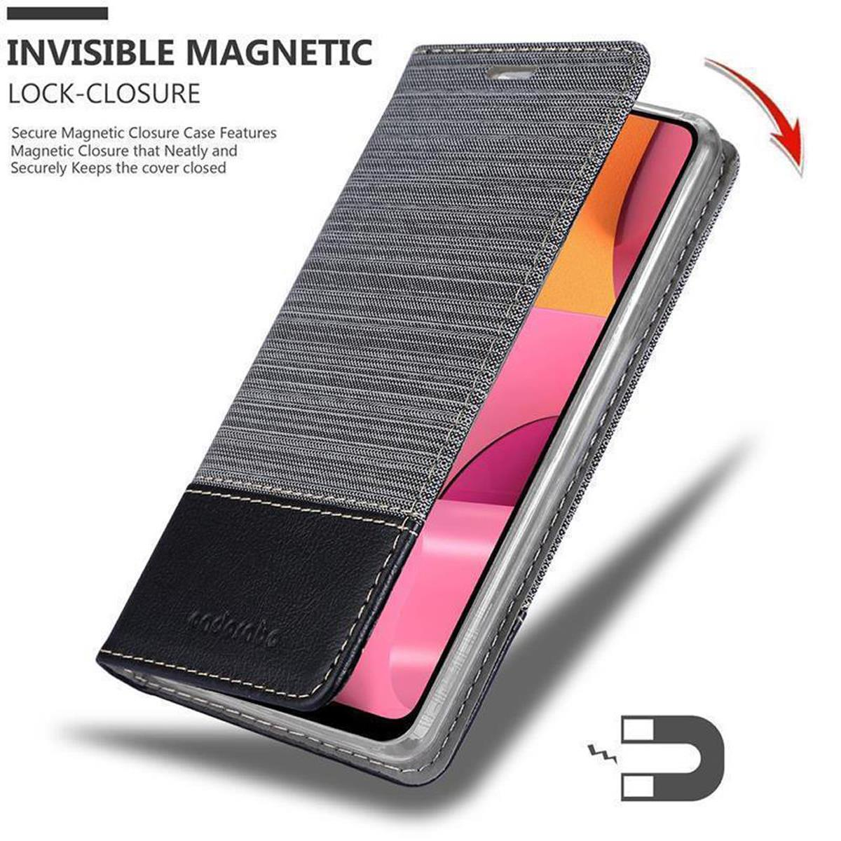 Una custodia per telefono con un design grigio e nero. La custodia è aperta e mostra un telefono all'interno.