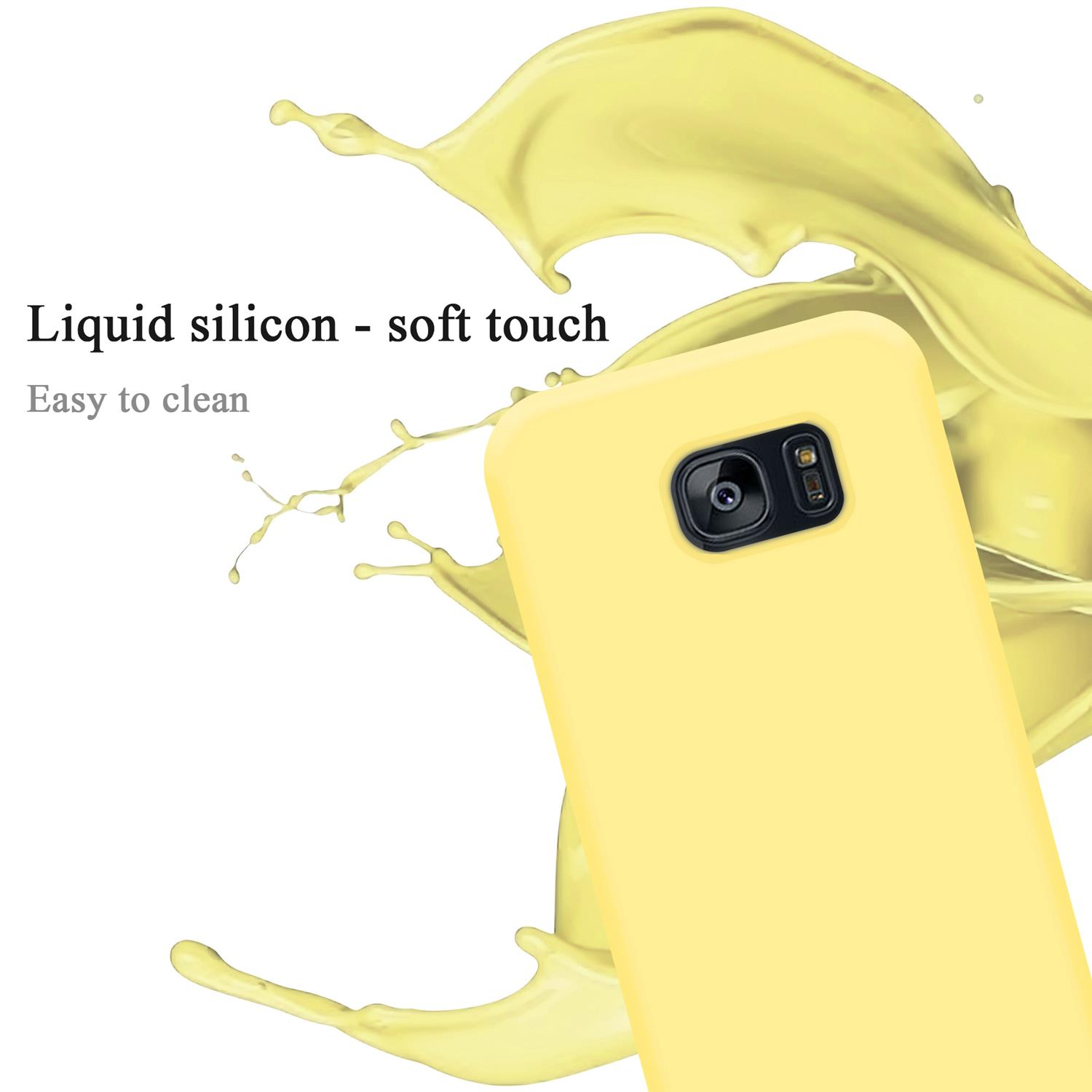 Eine gelbe Handyhülle mit einem Telefon darin. Die Handyhülle befindet sich in der Nähe eines gelben Flüssigkeitsspritzers. Die Handyhülle ist im Fokus.
