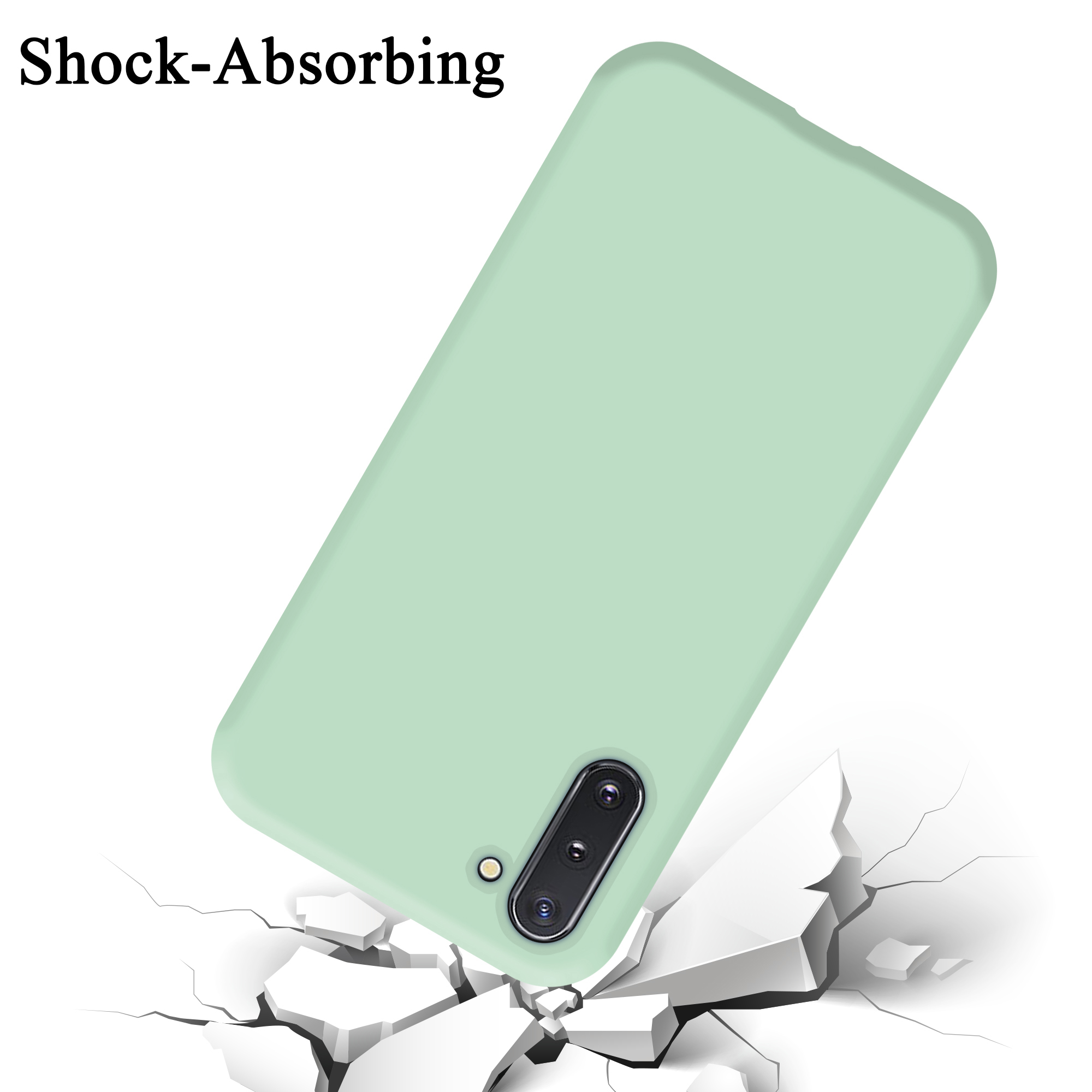 Una custodia per telefono verde che cade, con crepe che si formano sul terreno. La custodia è verde menta.