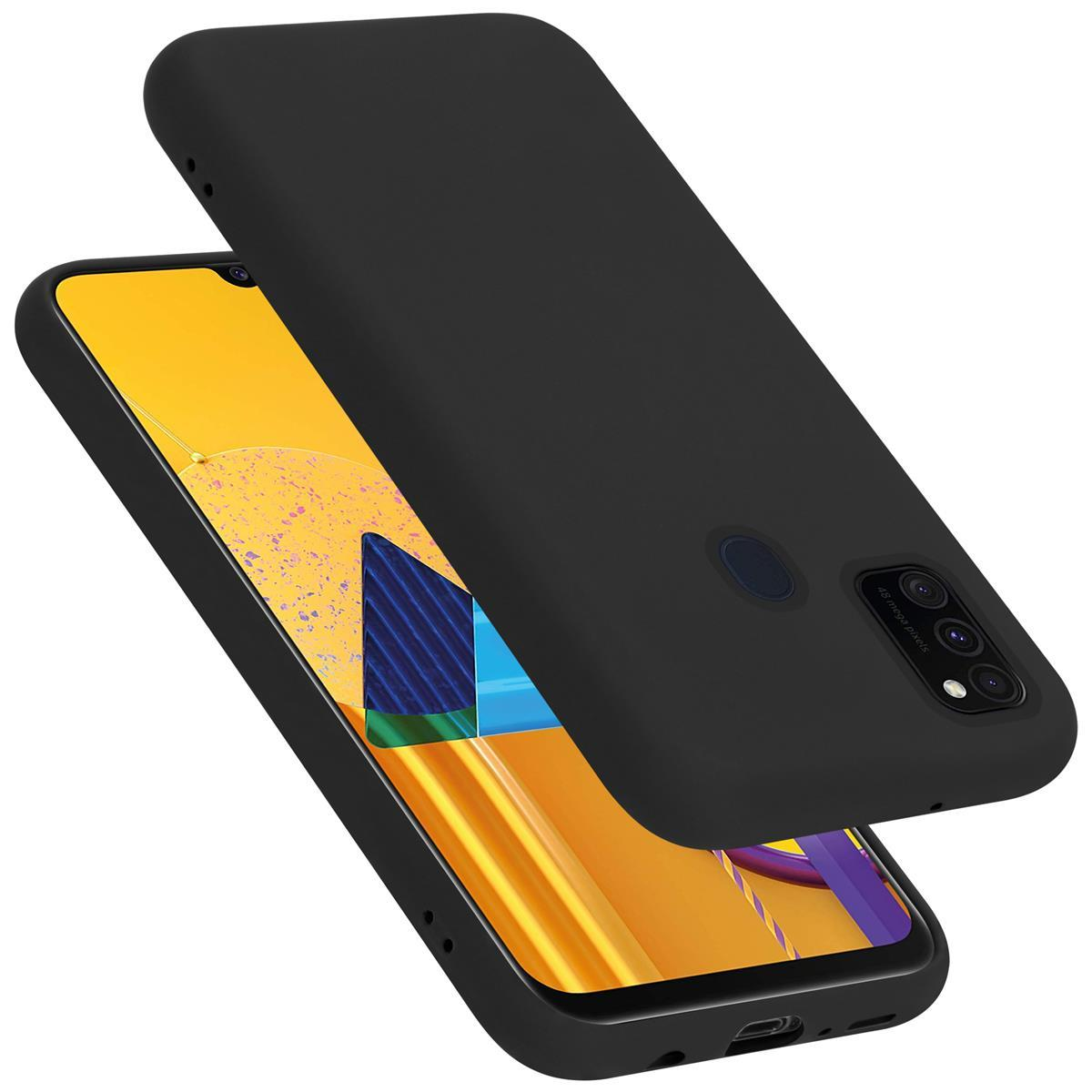 Schwarze Handyhülle und Handy, schräge Ansicht.