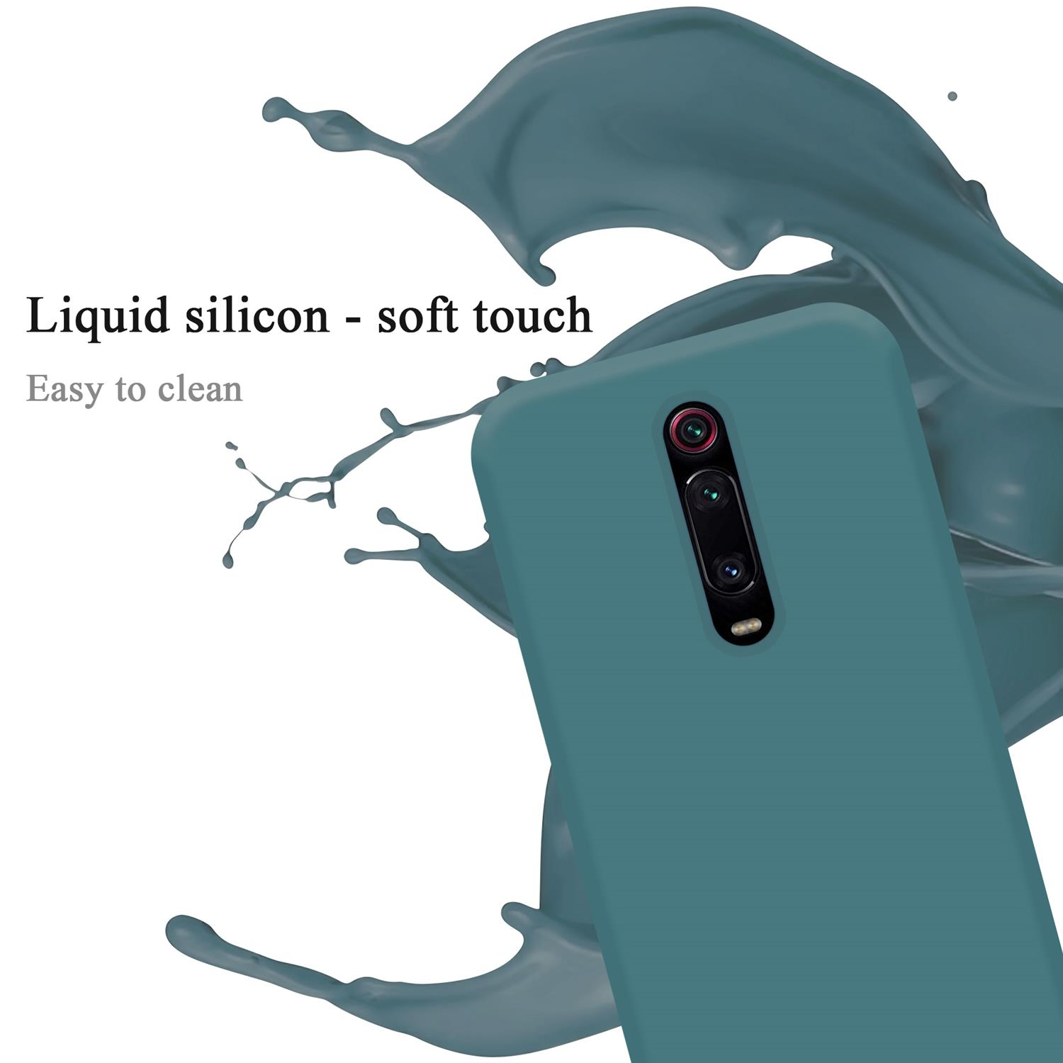Custodia blu con telefono dentro. Testo: Silicone liquido - tocco morbido. Spruzzo blu sullo sfondo.