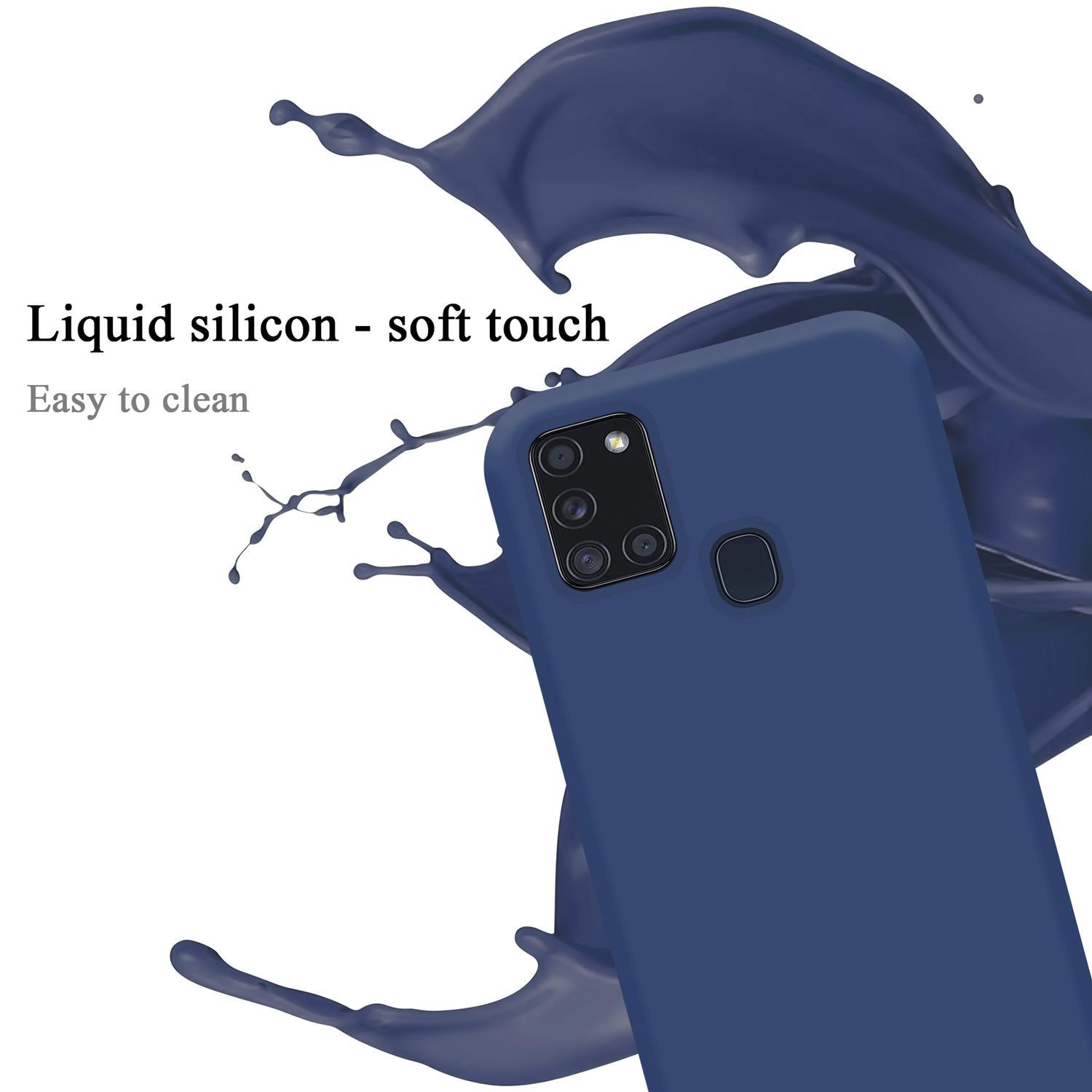 Una custodia per telefono blu scuro con uno schizzo di vernice blu. Testo: 'Silicone liquido - tocco morbido.'