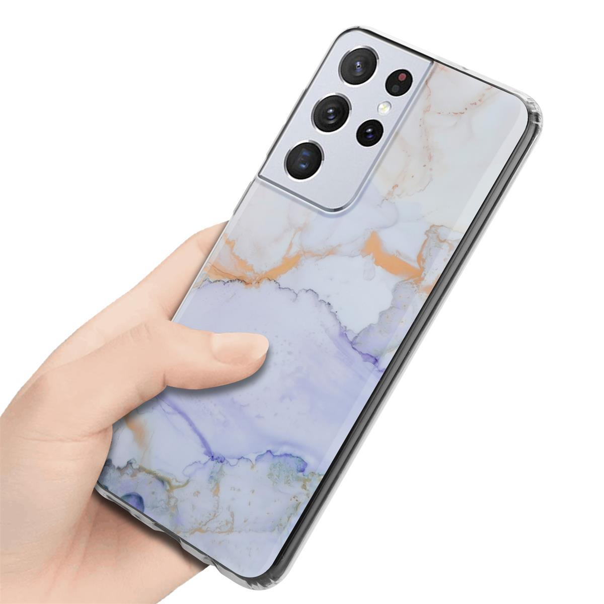 Una mano che tiene un telefono in una custodia trasparente con un design marmorizzato e uno sfondo bianco.