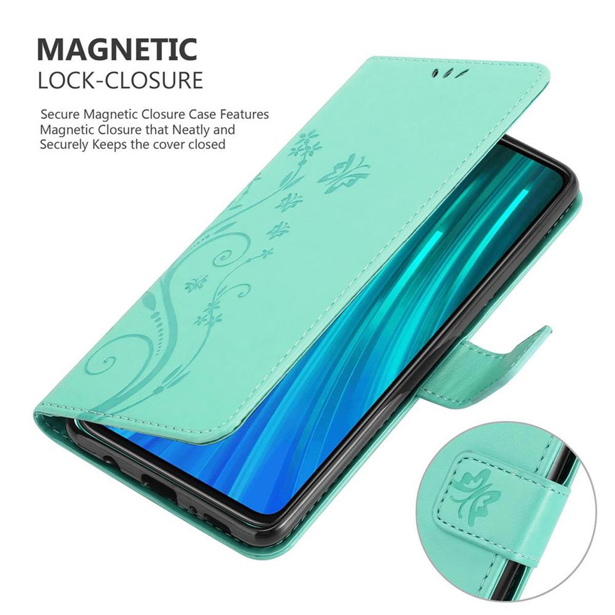 Una custodia per telefono verde menta con un design floreale. Il telefono è visibile all'interno.